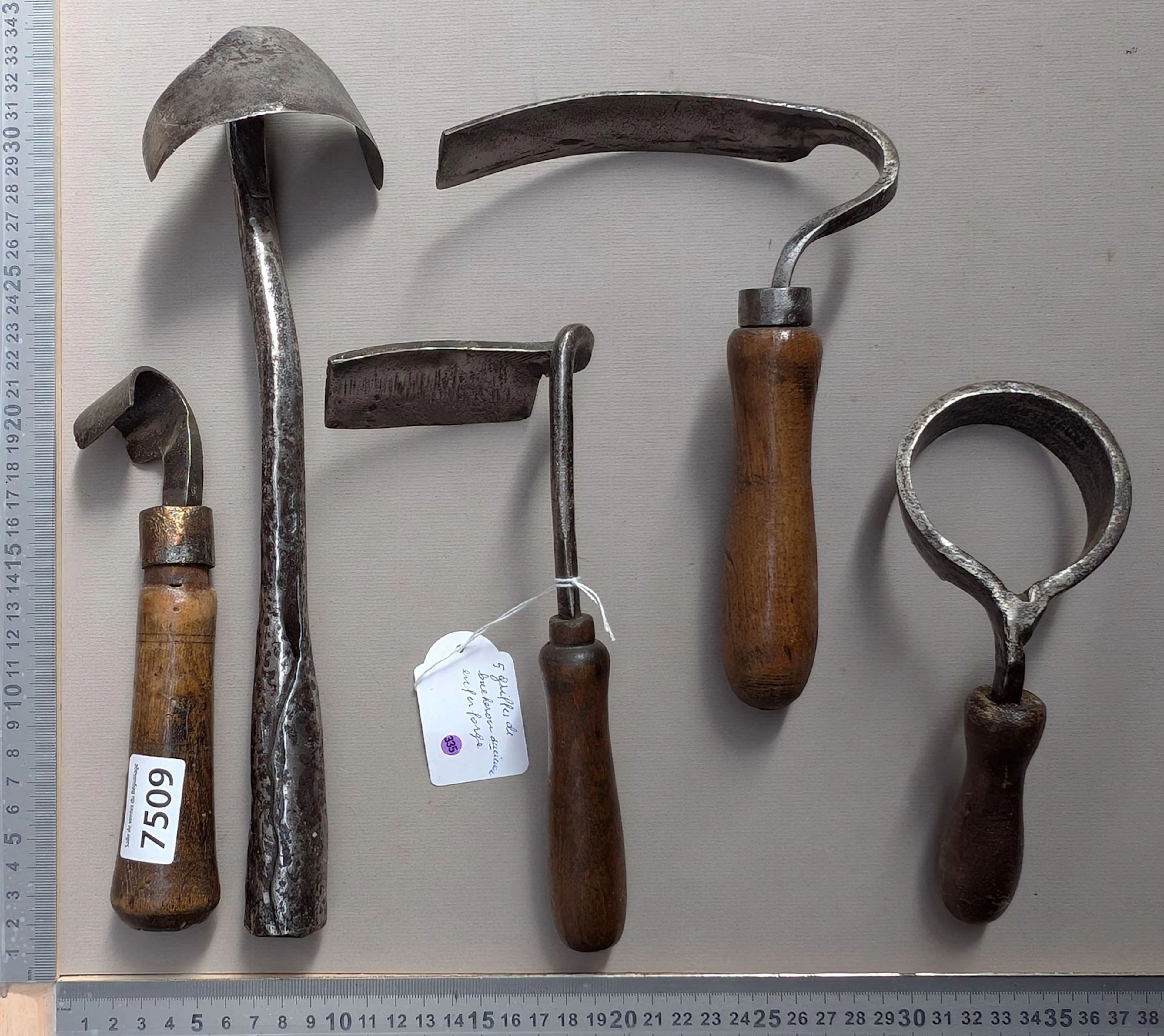 5 antique wrought-iron lumberjack claws—see photos for dimensions and condition