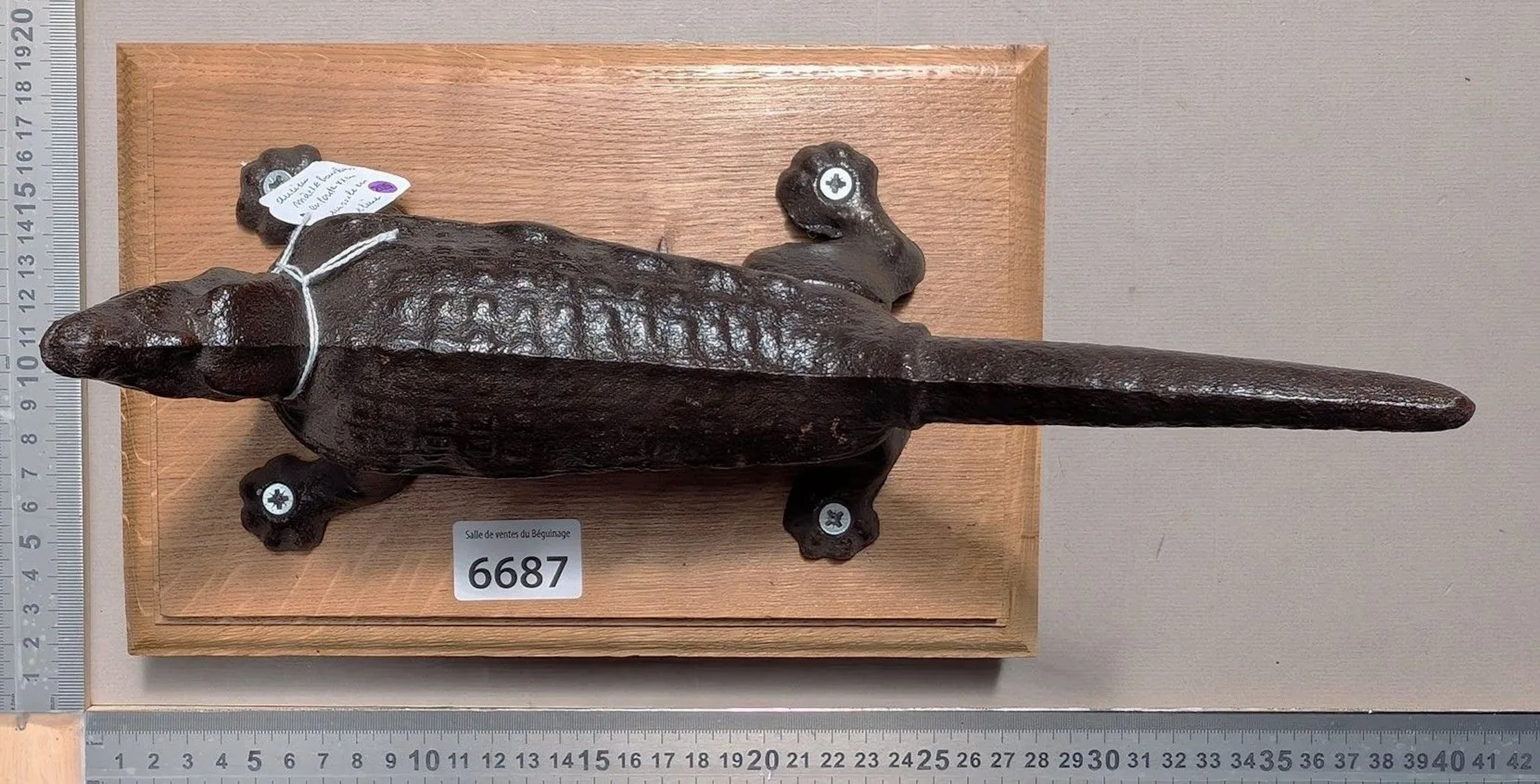 1 antique cast-iron cork-stopping tool on an oak base—see photos for