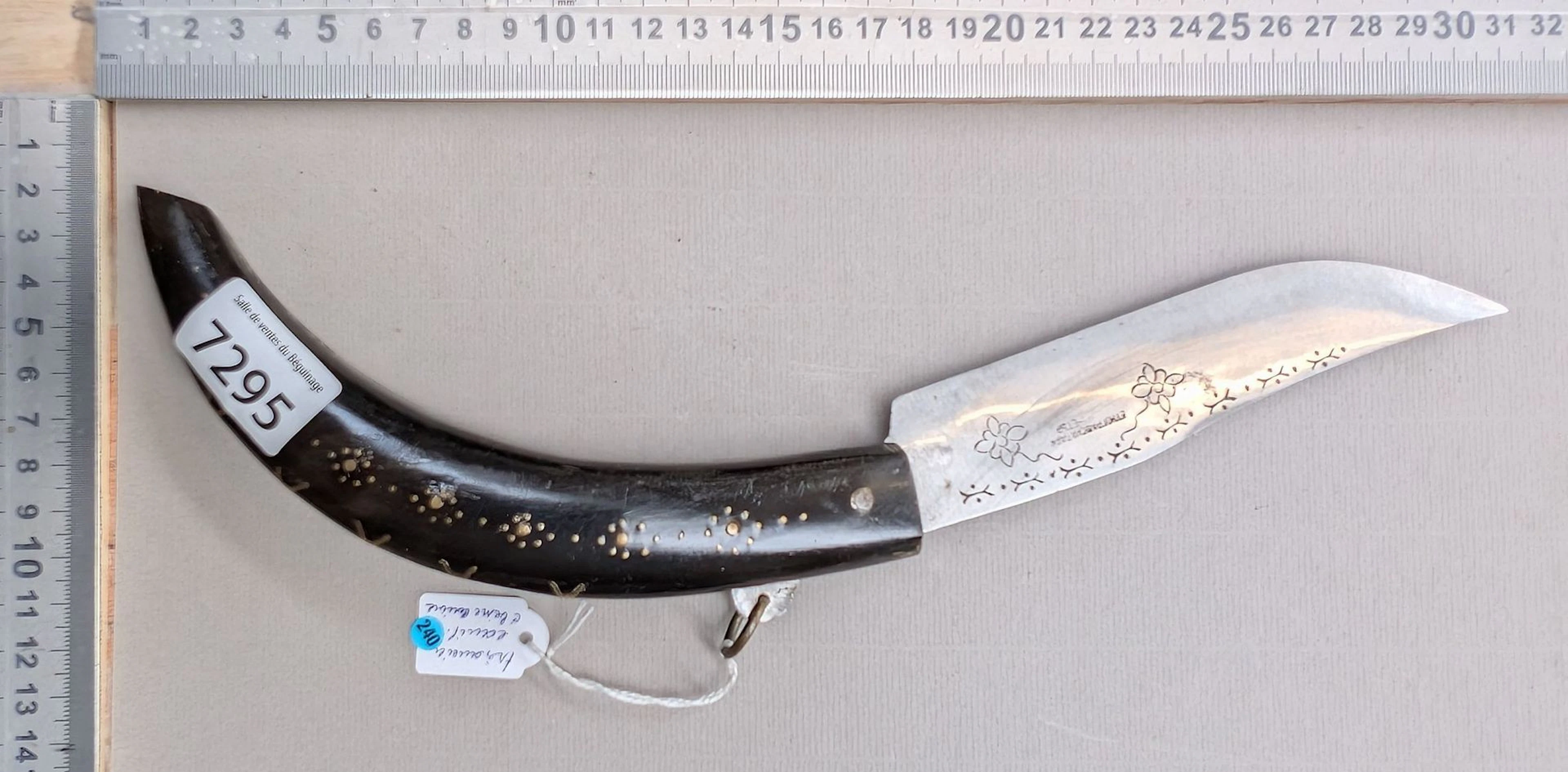 Antique knife with a beautifully decorated horn handle—see photos