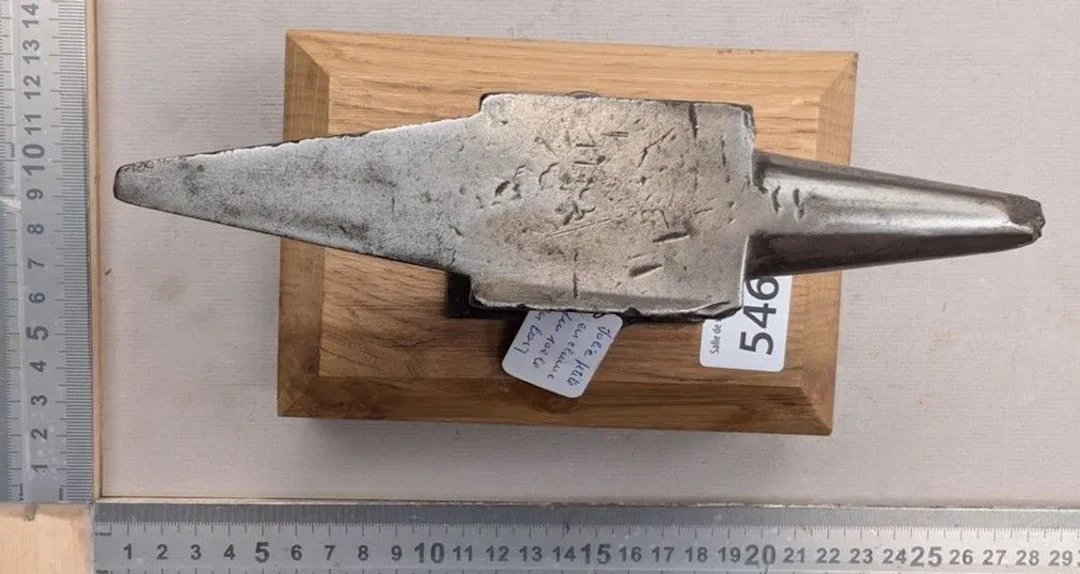 Cute little anvil on a wooden base—see photos for dimensions and condition