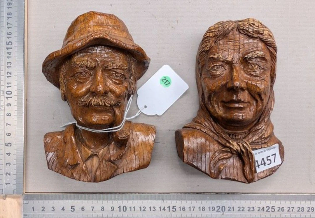 2 carved wooden busts of a couple—see photos for dimensions and condition