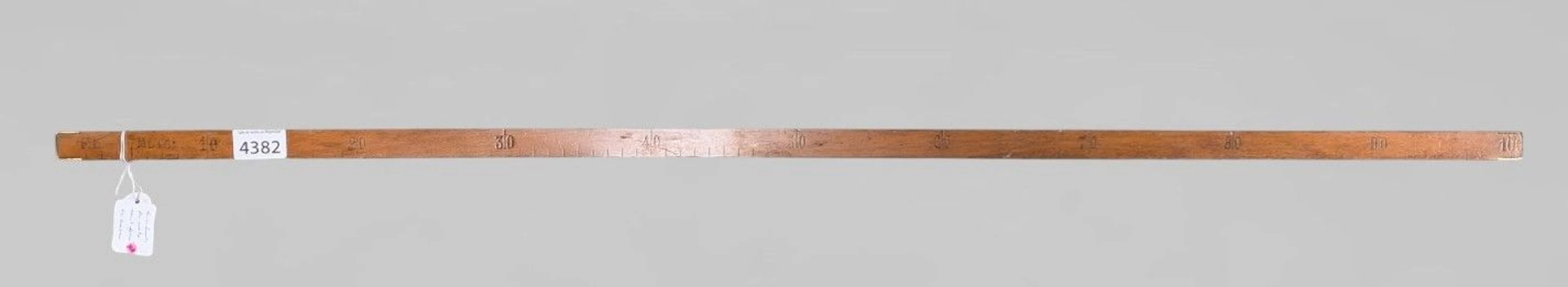 Antique wooden and brass measuring tape—see photos for dimensions and condition