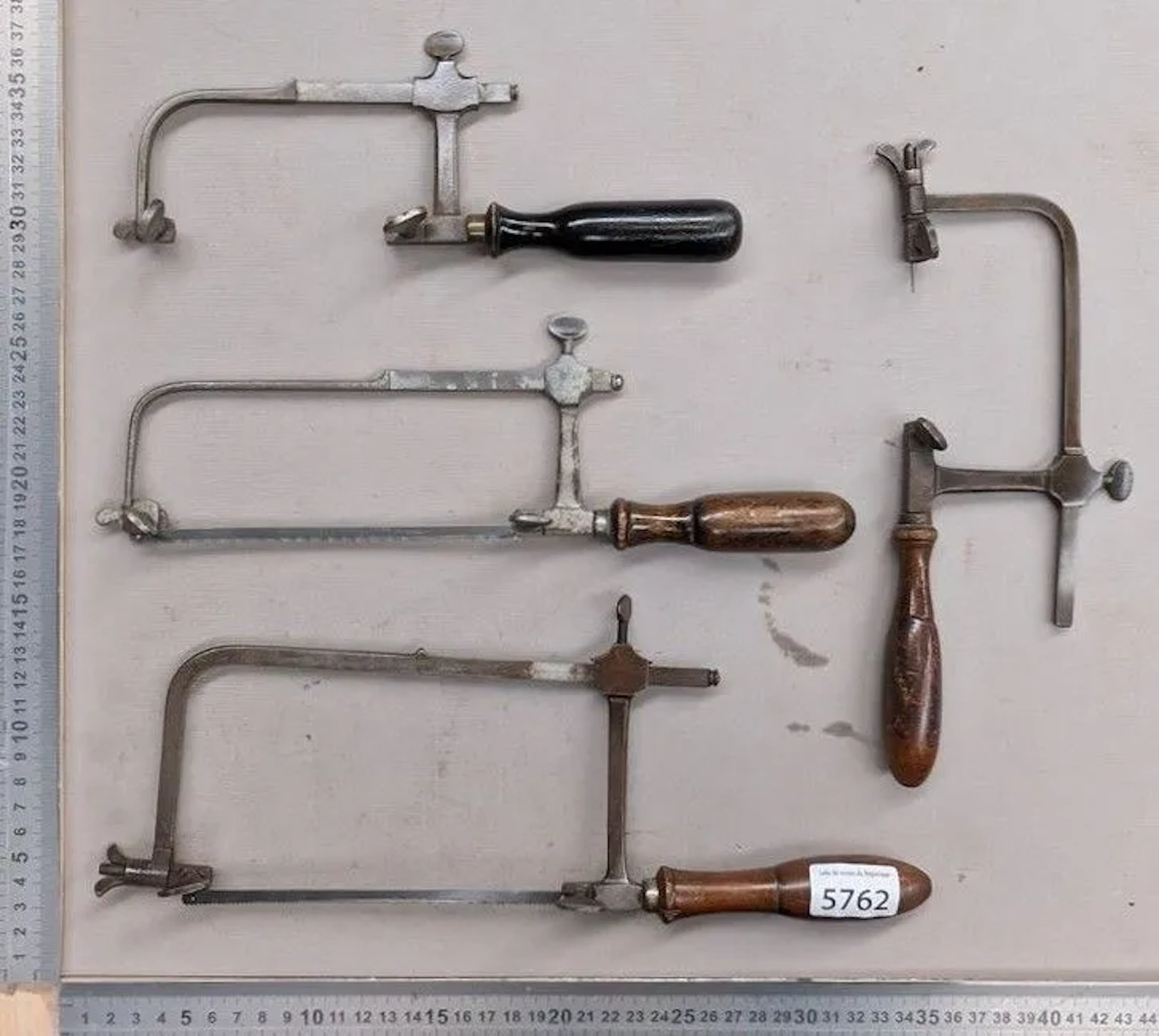 4 small watchmaker's saws—see photos for dimensions and condition