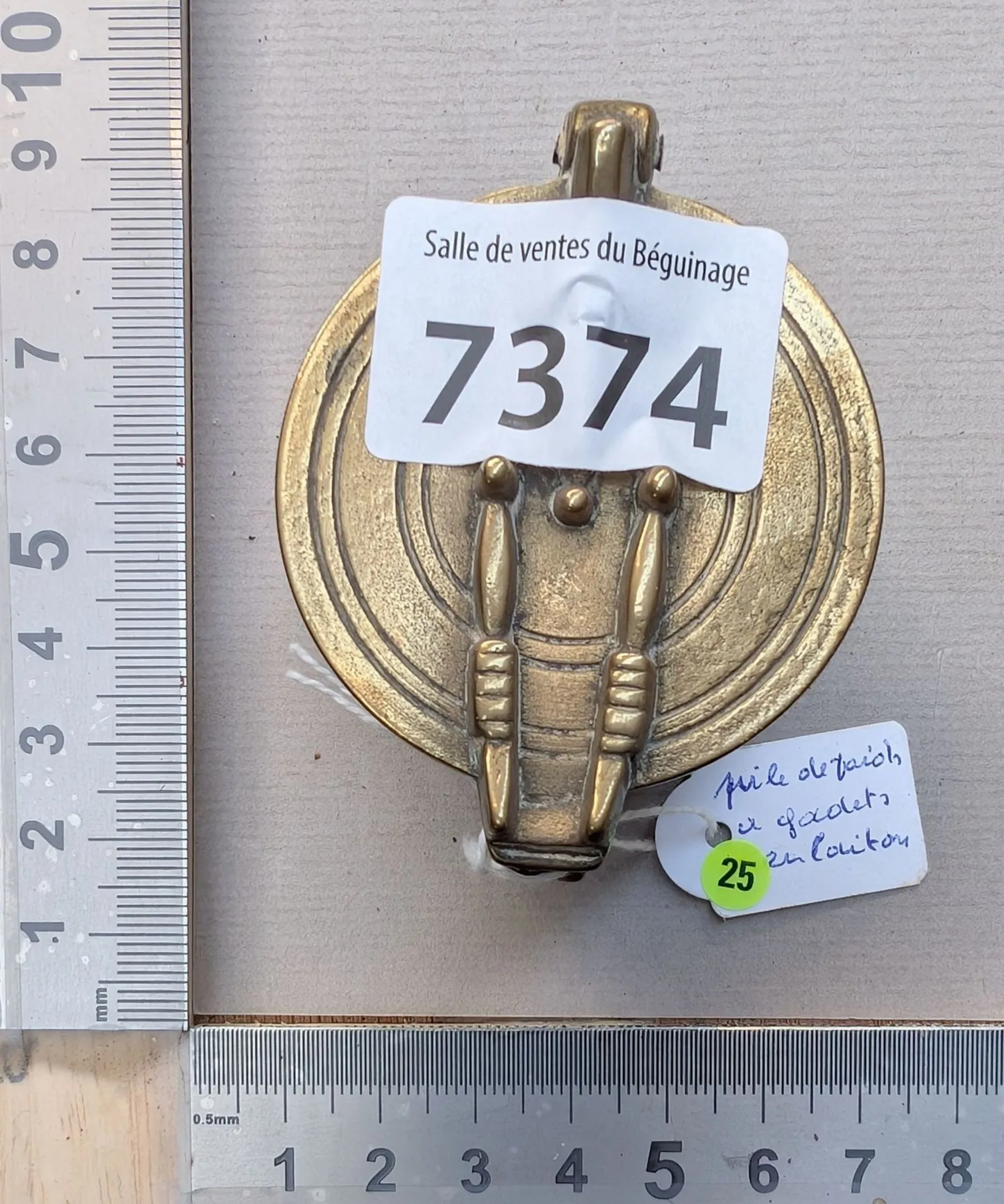 Stack of brass cup weights—see photos for dimensions and condition