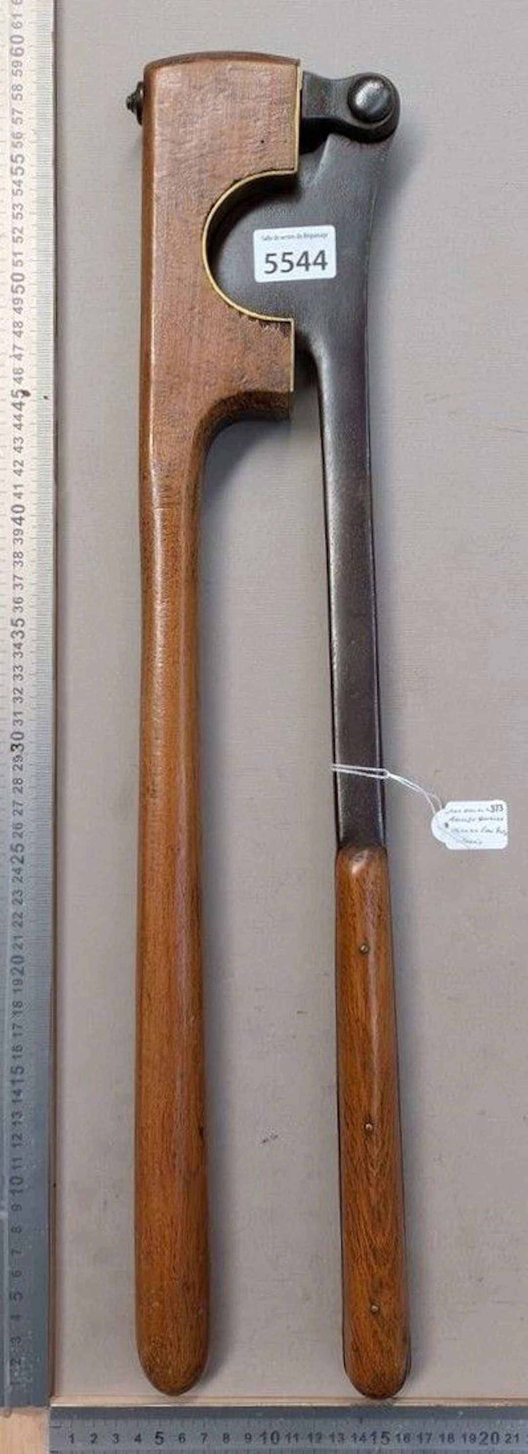 An antique tail clipper made of steel, brass, and wood—see photos