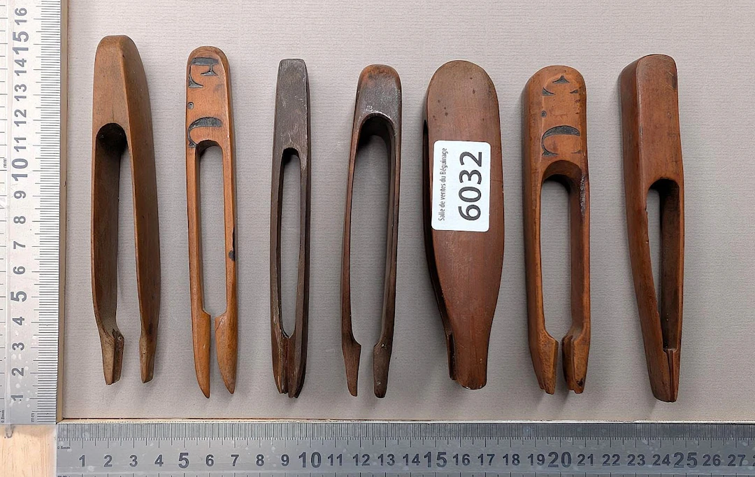 7 vintage wooden clothespins—see photos for dimensions and condition