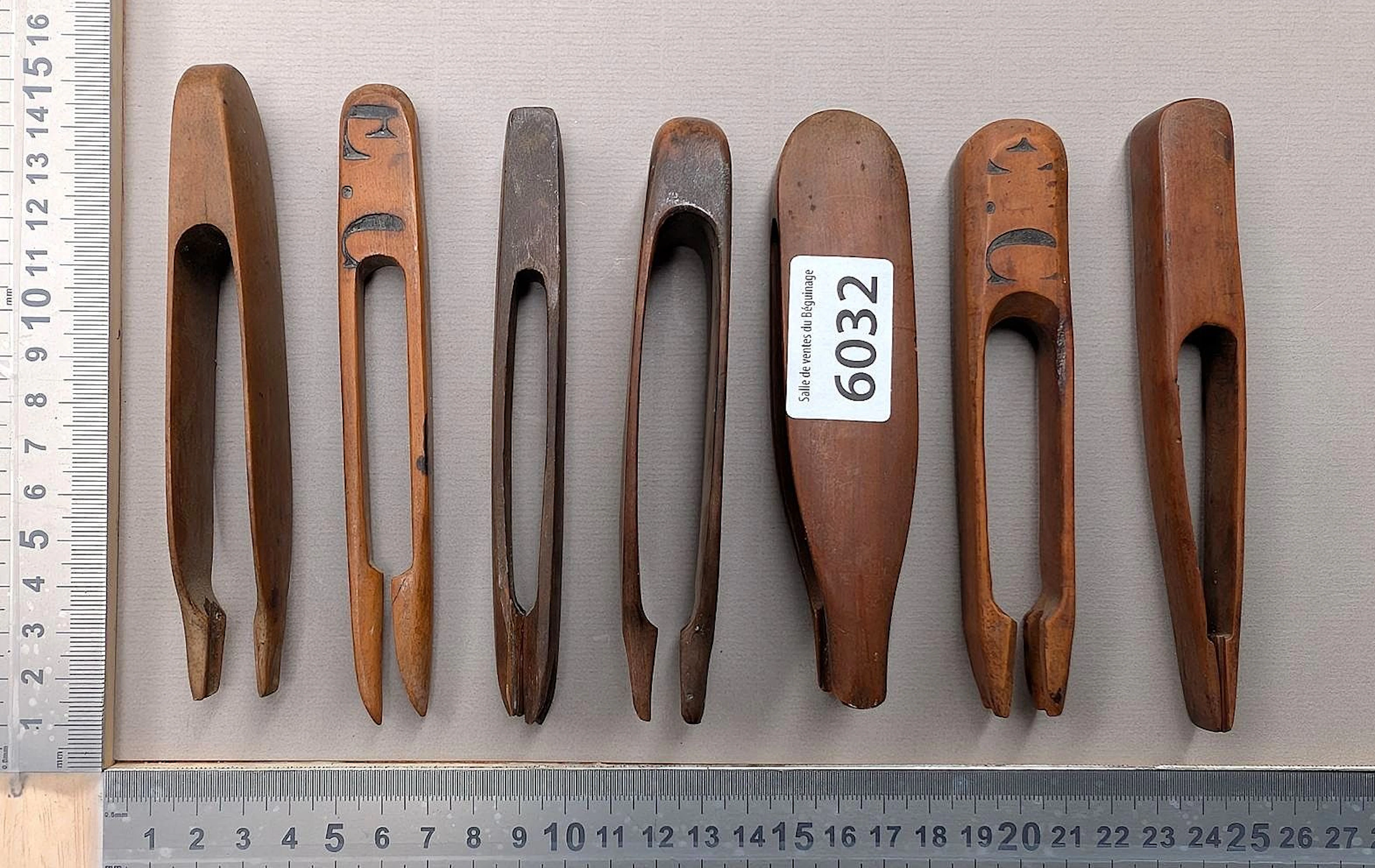 7 vintage wooden clothespins—see photos for dimensions and condition