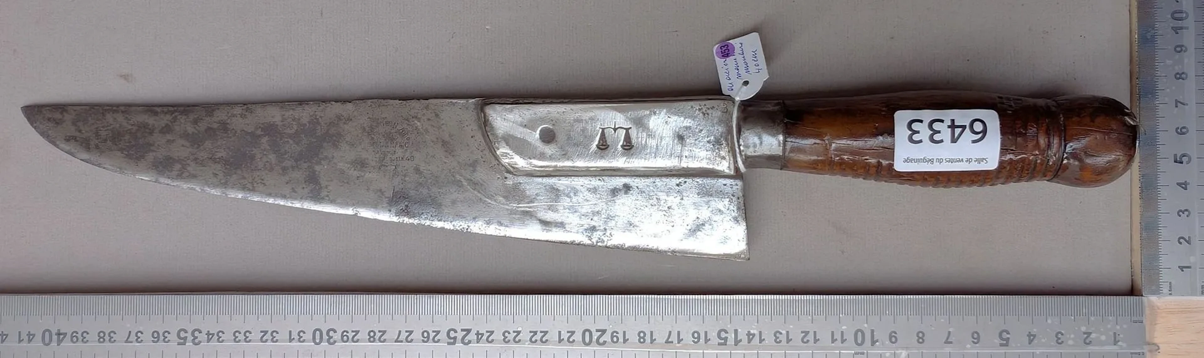 1 antique bread-slicing cleaver with a molded steel handle—see photos