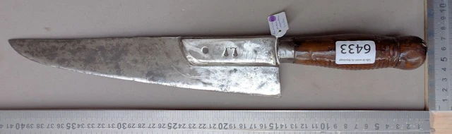1 antique bread-slicing cleaver with a molded steel handle—see photos