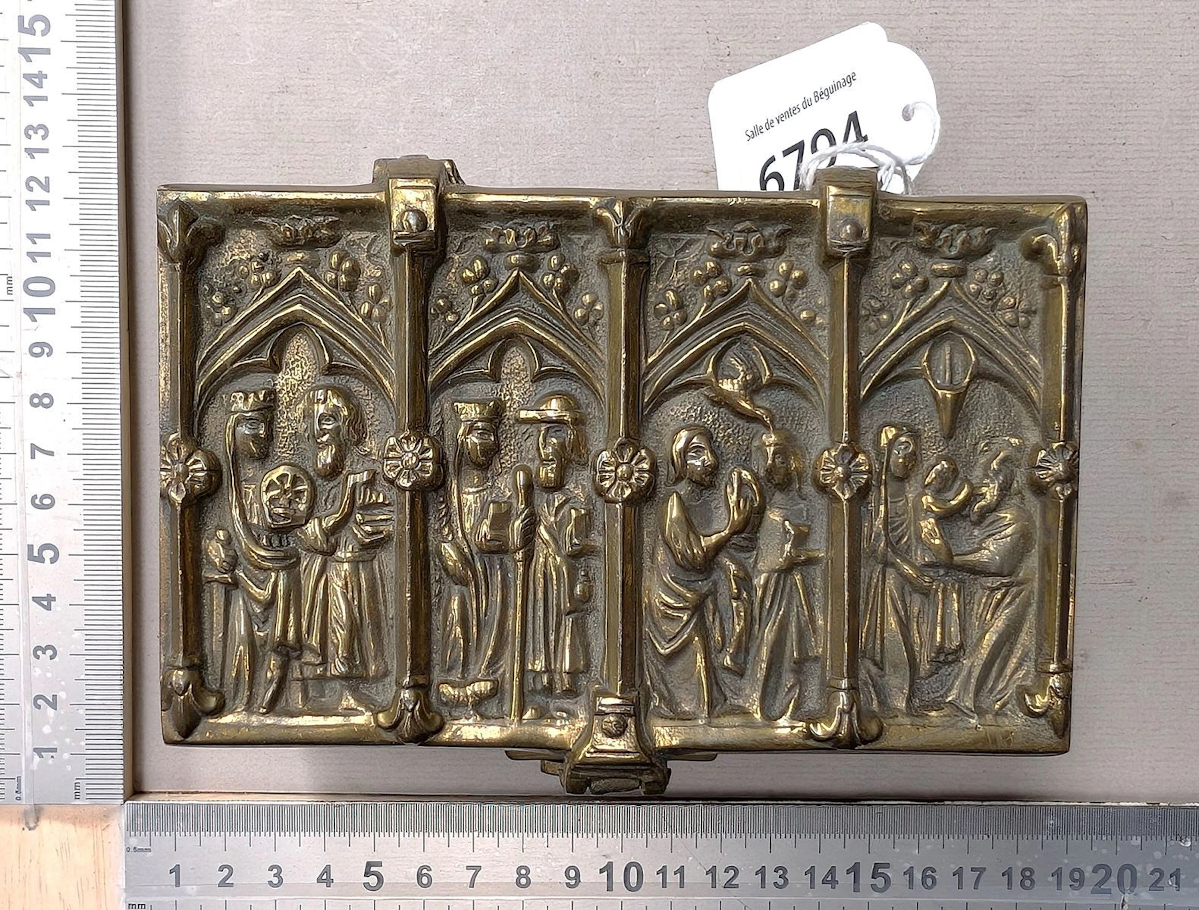 1 small Gothic-style bronze safe from the late 19th century—see photos