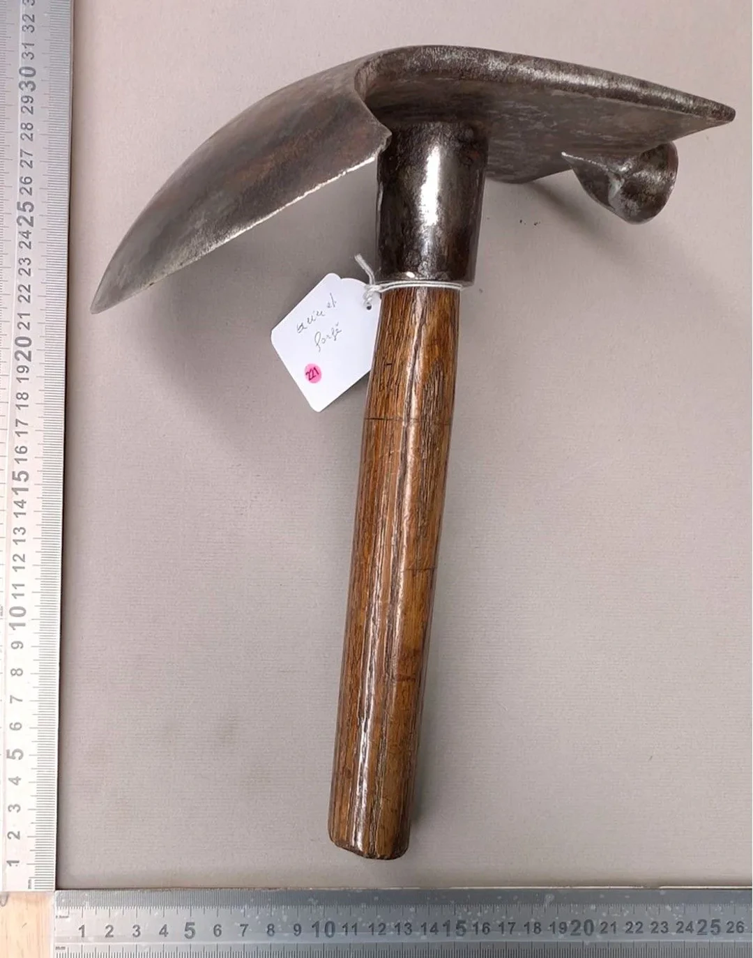 A forged steel adze—see photos for dimensions and condition