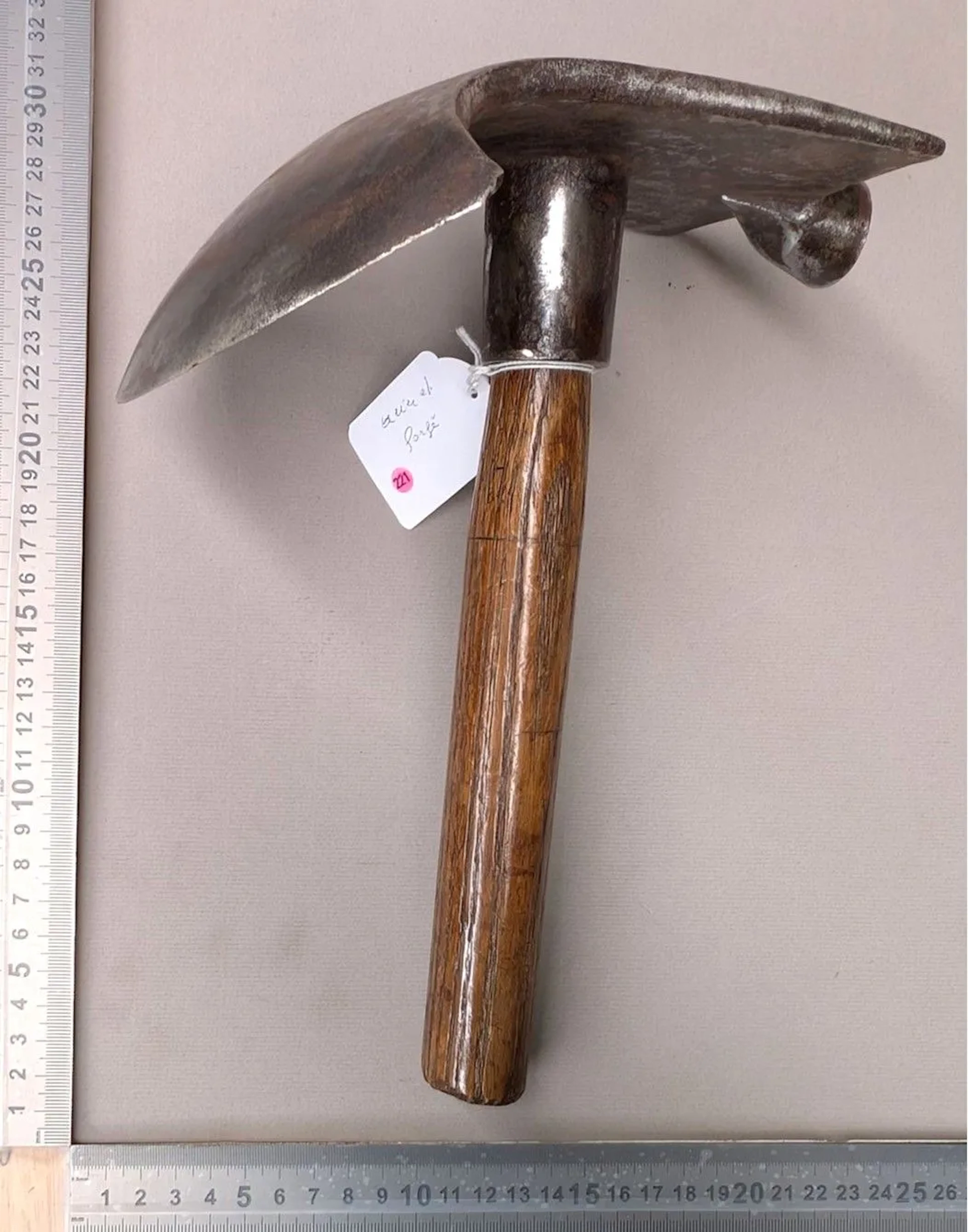 A forged steel adze—see photos for dimensions and condition
