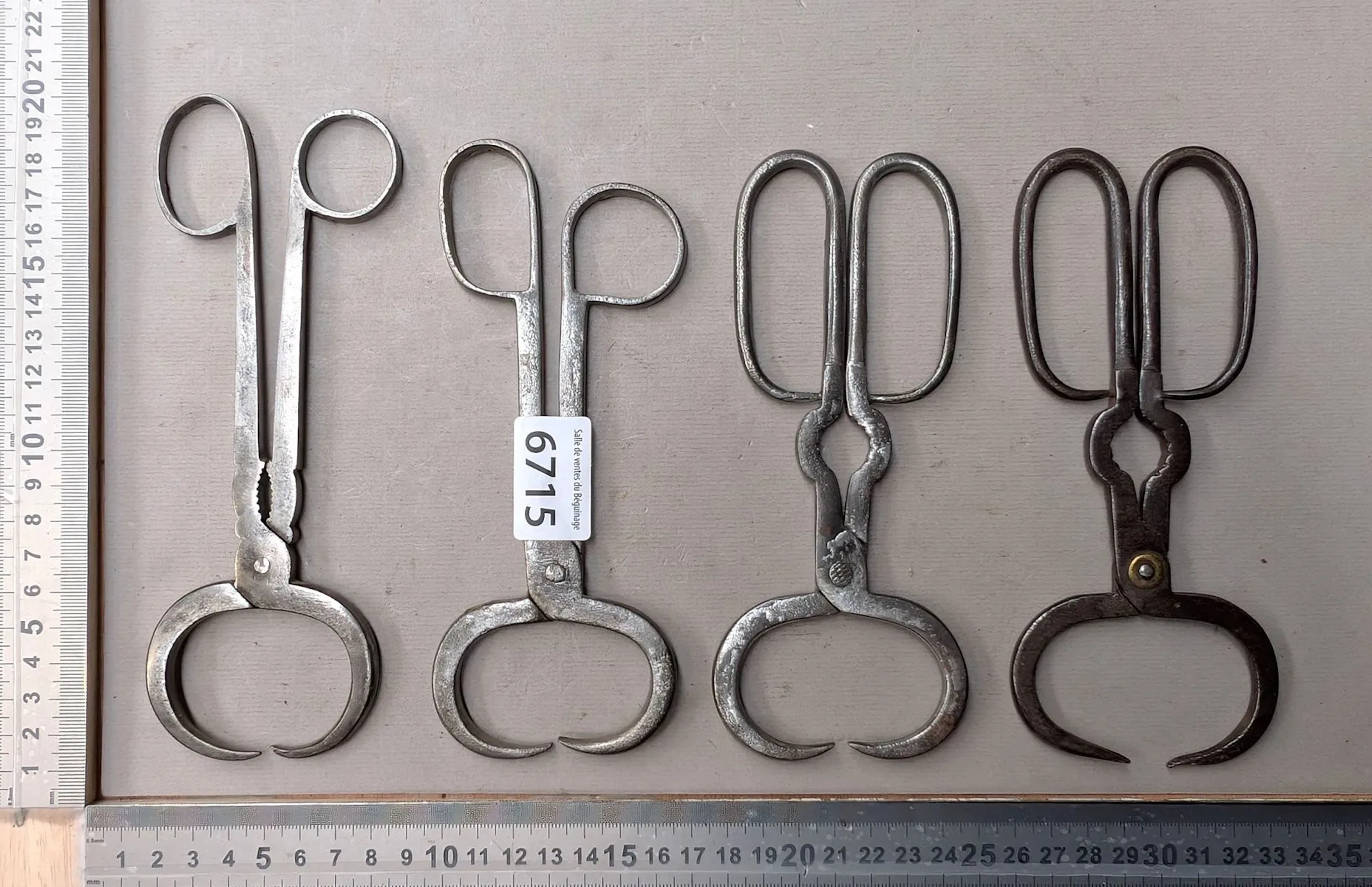 4 antique 19th-century sugar-breaking tongs—see photos for dimensions