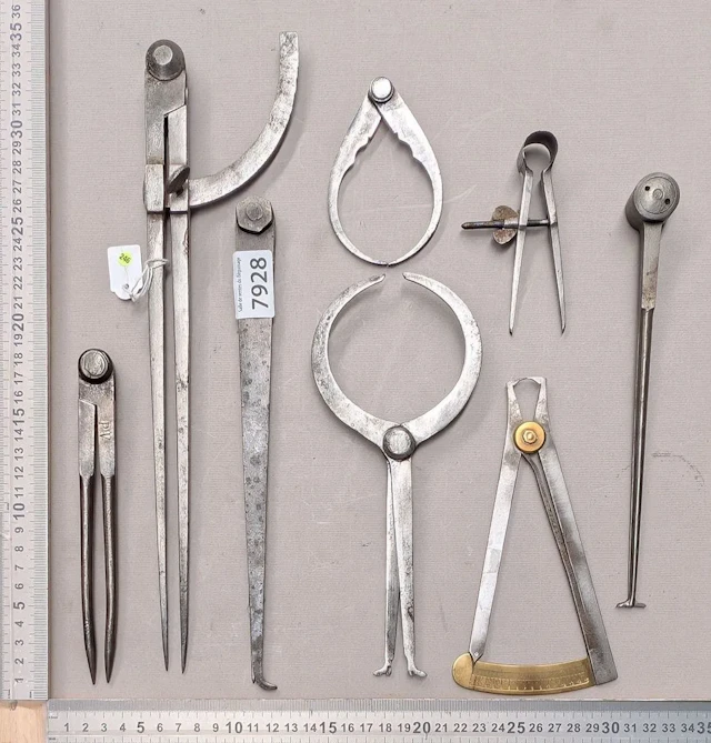 1 set of 8 different compasses—see photos for dimensions and condition