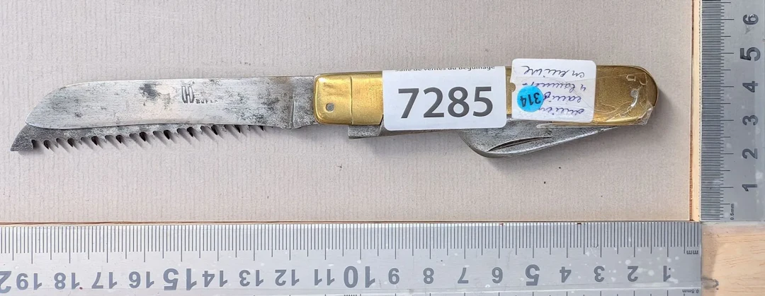 1 antique knife with 4 brass blades—see photos for dimensions and condition