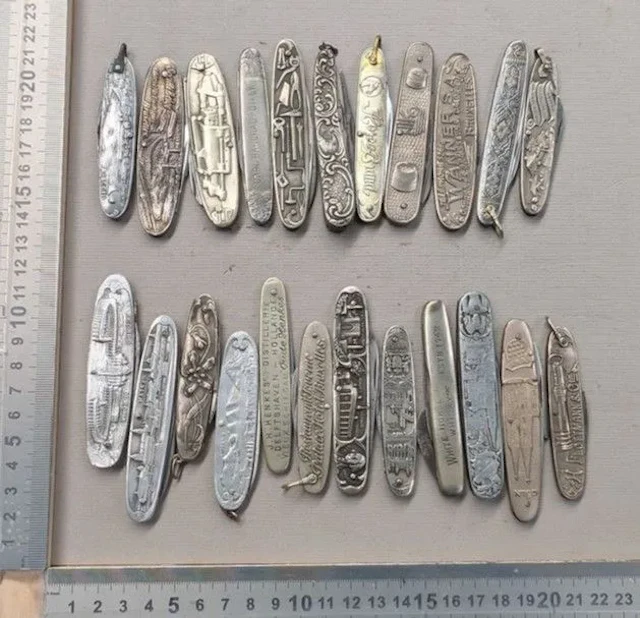 Set of 23 vintage promotional pocket knives from 1900—see photos for