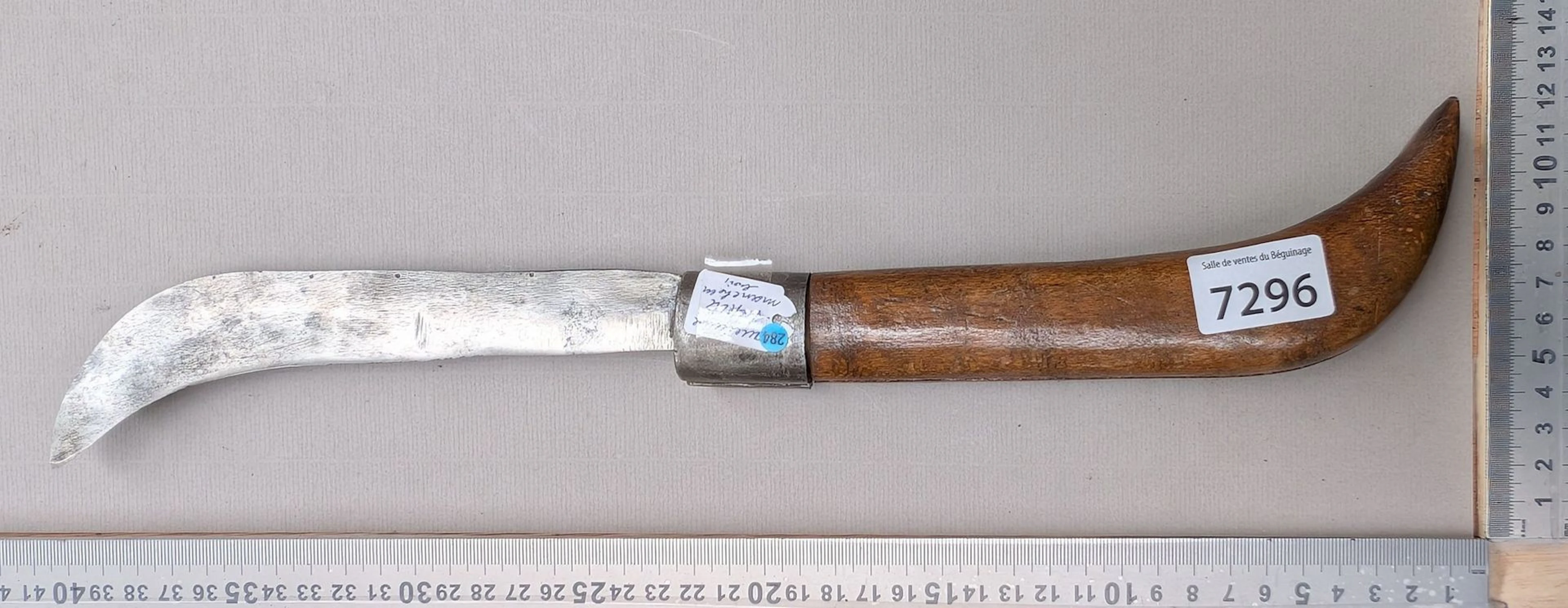 1 antique large pruning knife with a flat blade and wooden handle—see
