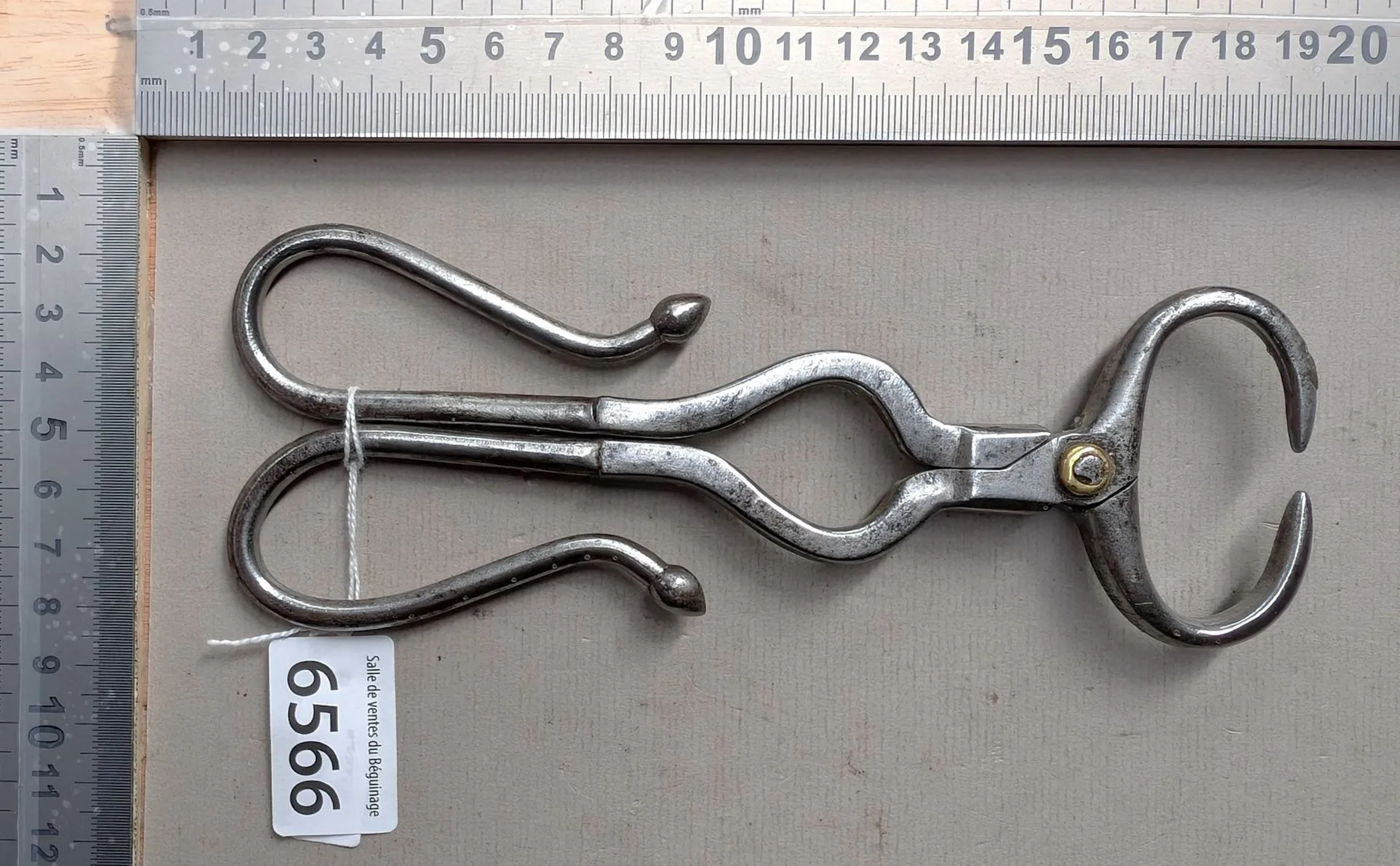 1 antique sugar tongs—see photos for dimensions and condition