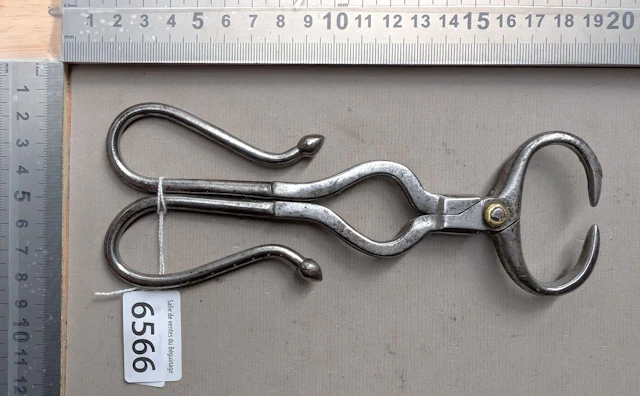 1 antique sugar tongs—see photos for dimensions and condition