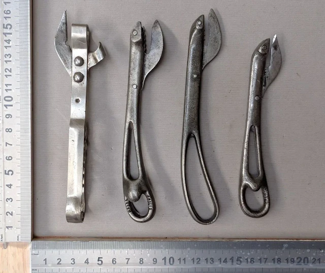4 antique can openers—see photos for dimensions and condition