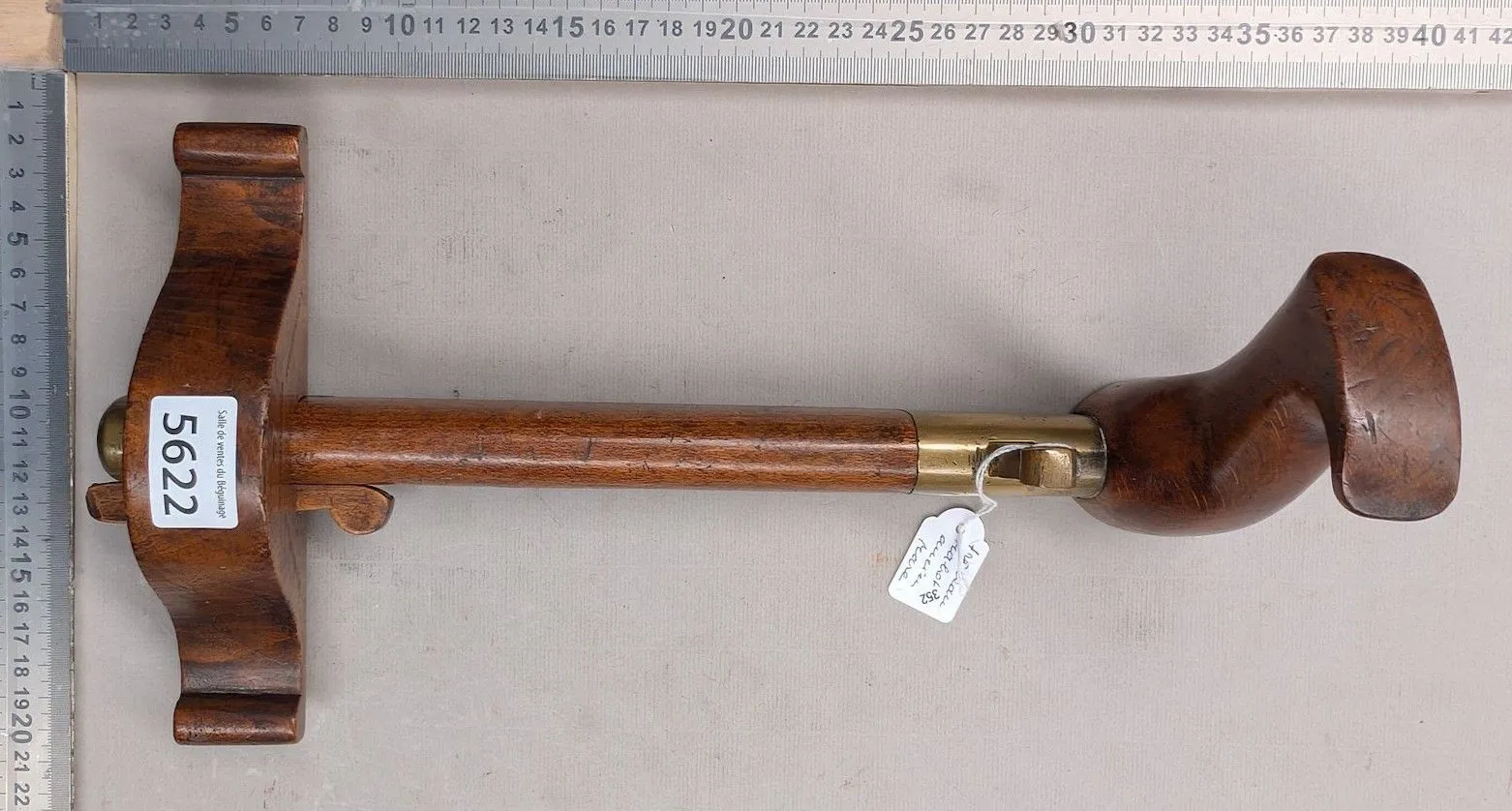 A very beautiful, rare antique plane made of wood, steel, and brass—see