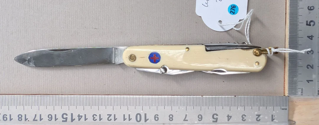 1 genuine 7-function DAMAS INOX knife—see photos for dimensions and condition