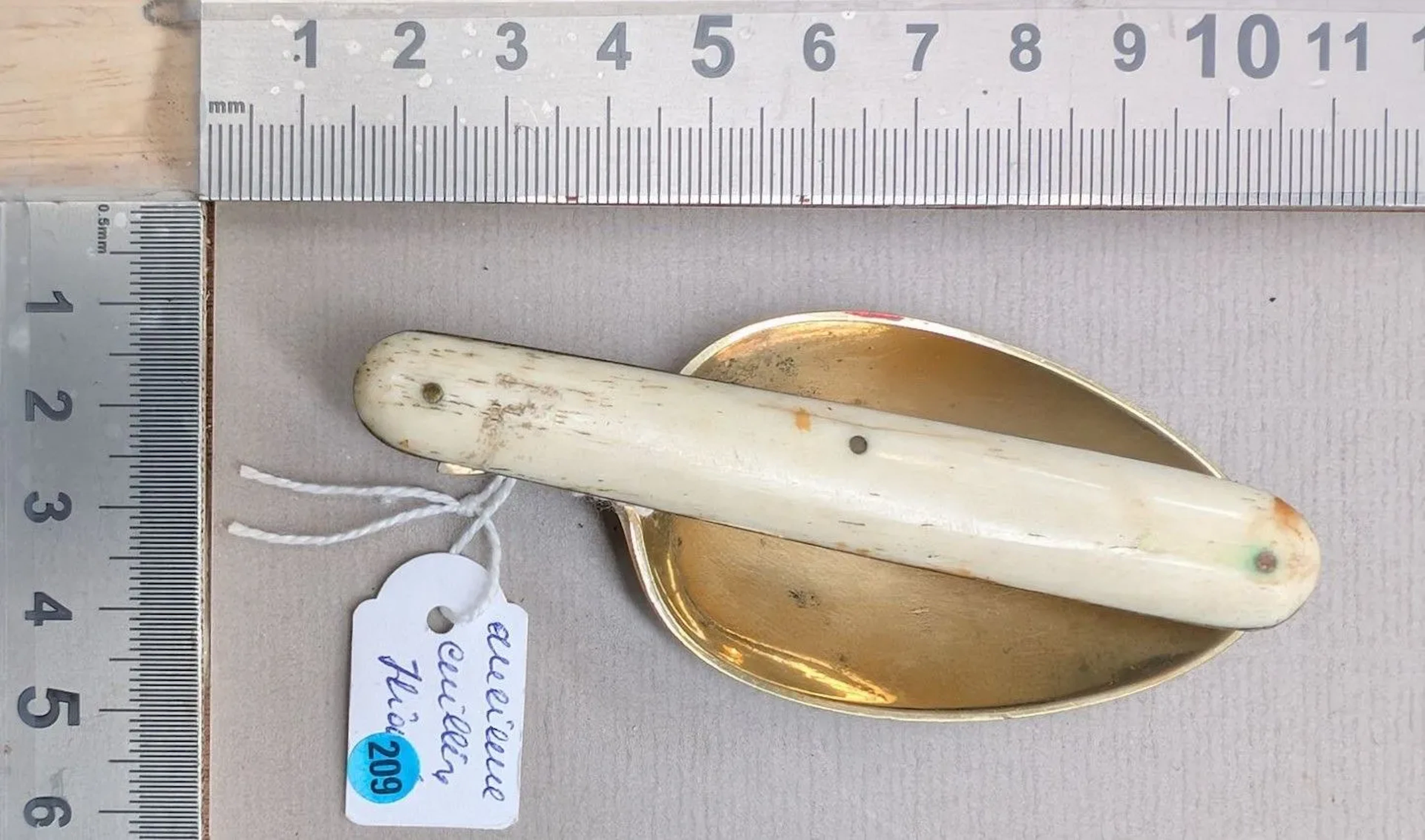 Antique folding spoon—see photos for dimensions and condition