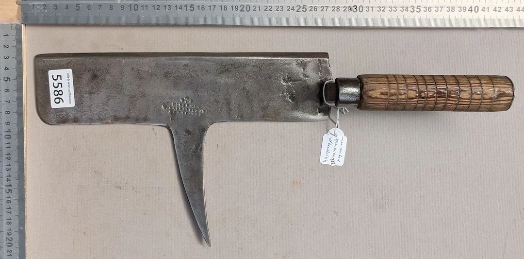 An antique slate-cutting tool—see photos for dimensions and condition