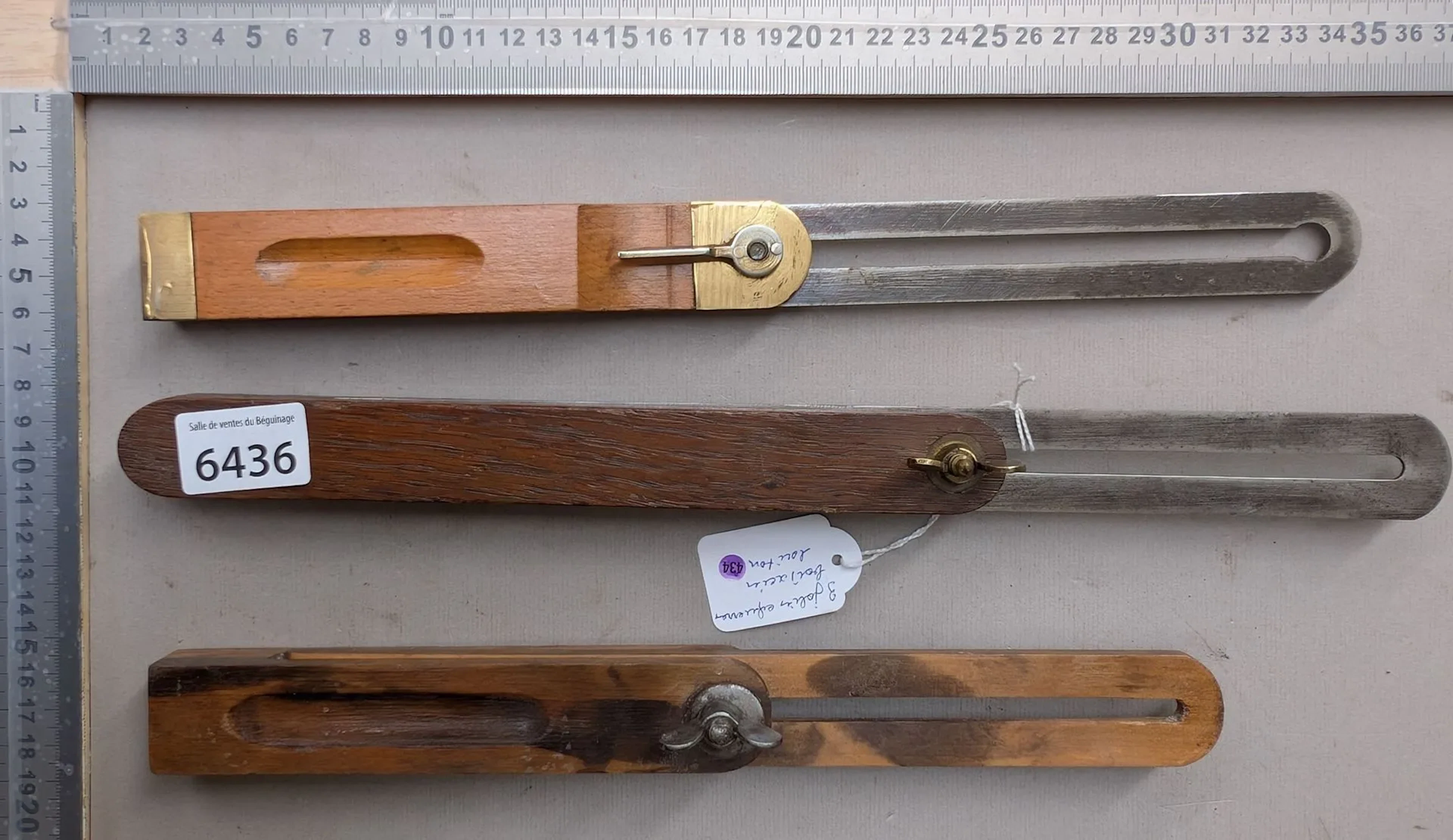 3 attractive wood, steel, and brass brackets—see photos for dimensions