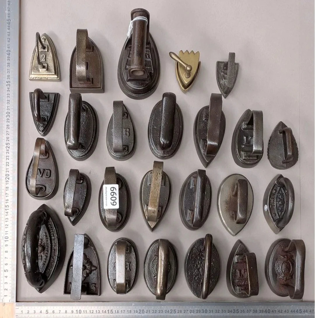 Set of 26 small irons—see photos for dimensions and condition