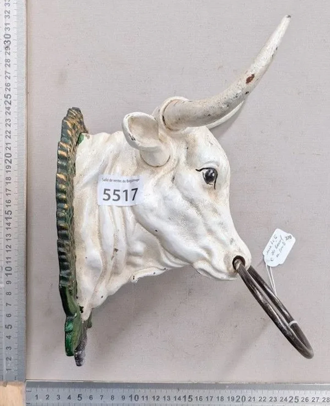 A cast-iron bull's head—see photos for dimensions and condition