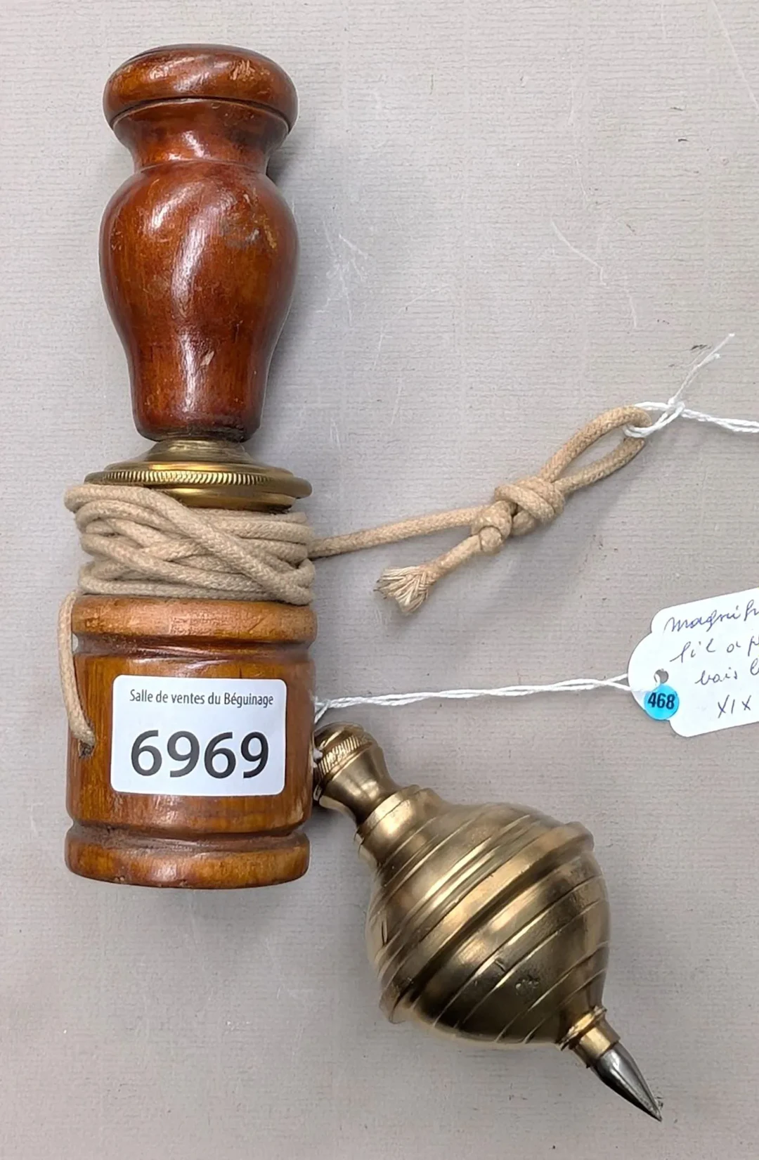 Beautiful 19th-century bronze-tipped wooden plumb bob—see photos for