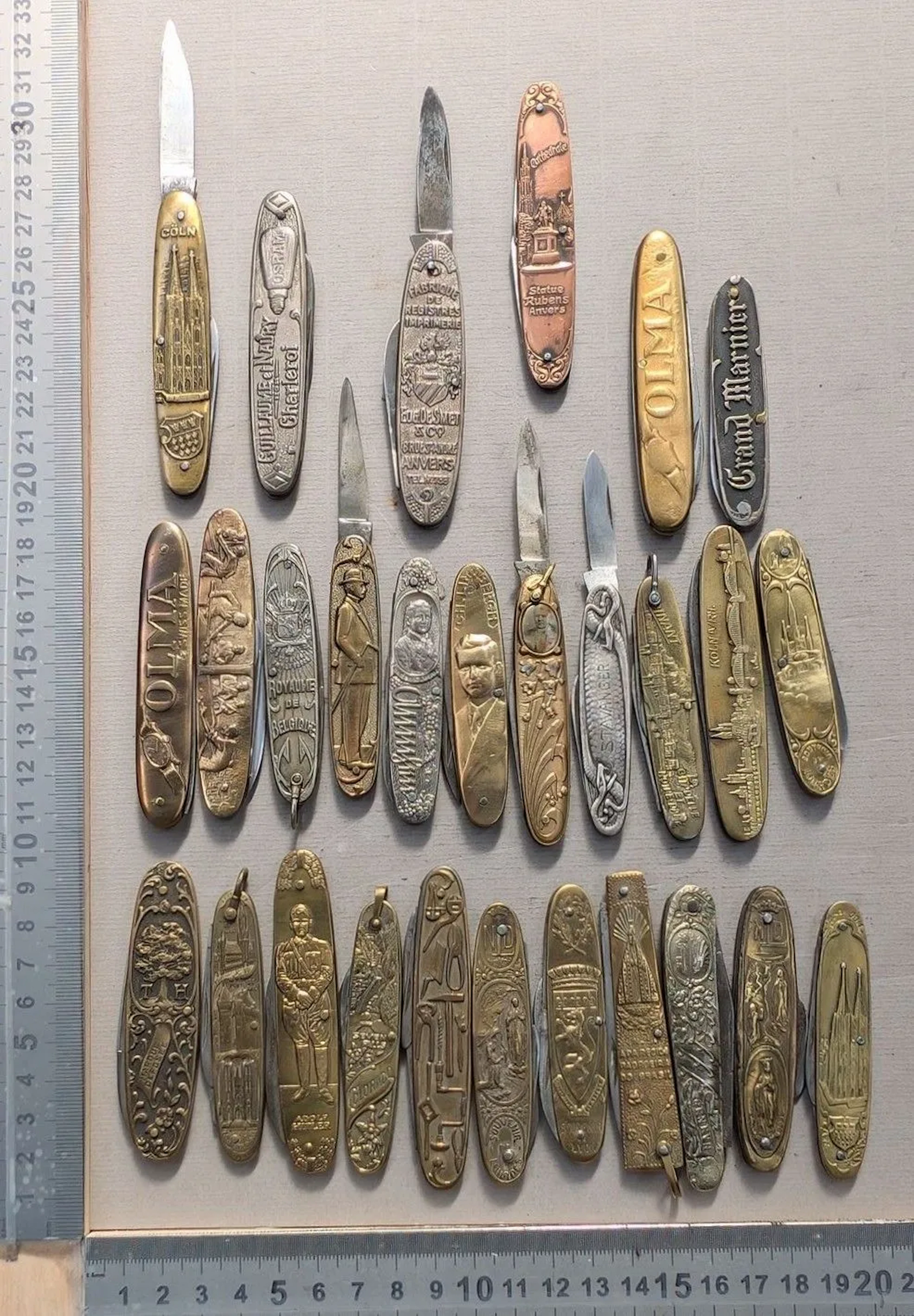 Set of 28 vintage promotional pocket knives from 1900—see photos for