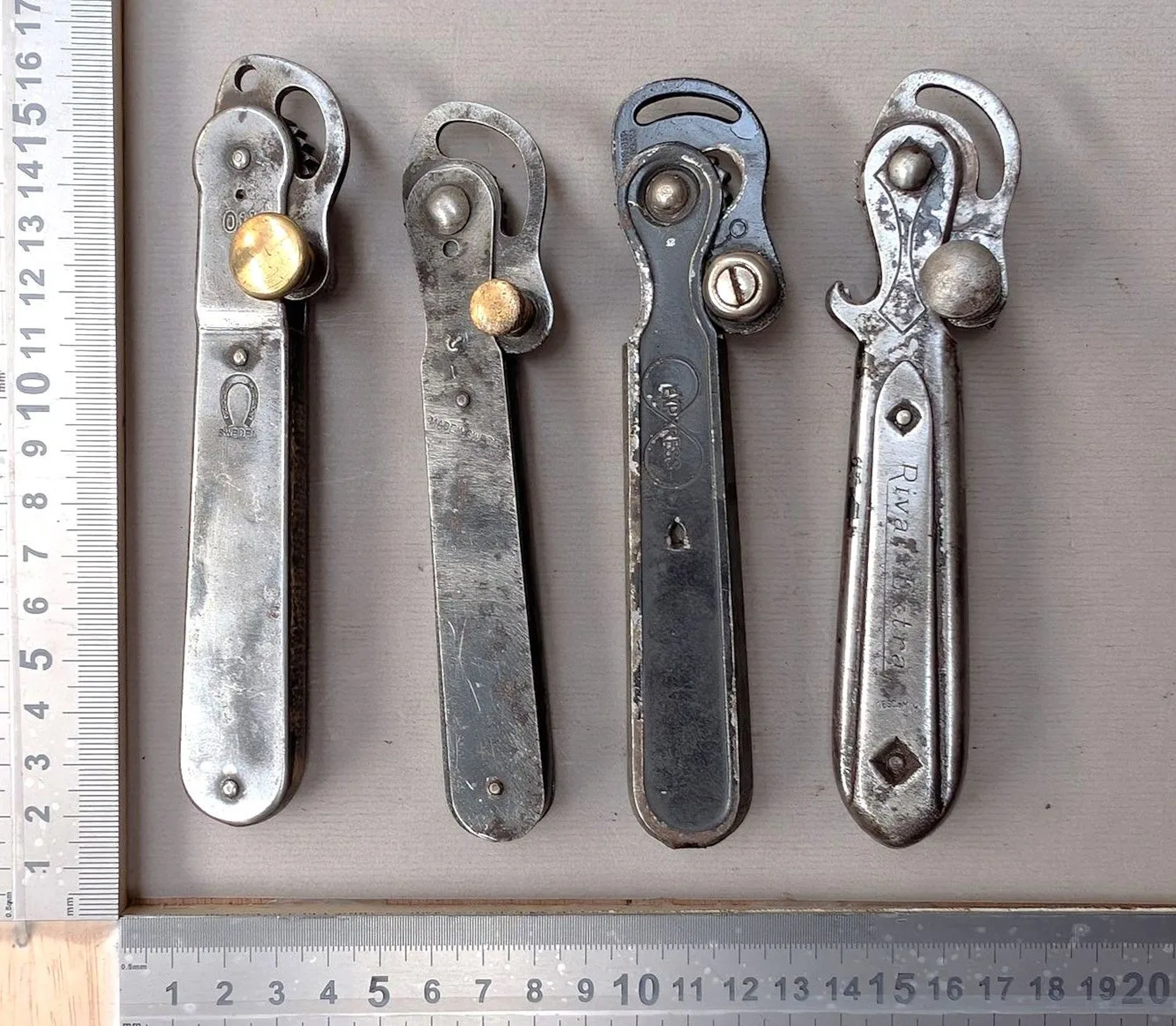 4 antique can openers—see photos for dimensions and condition