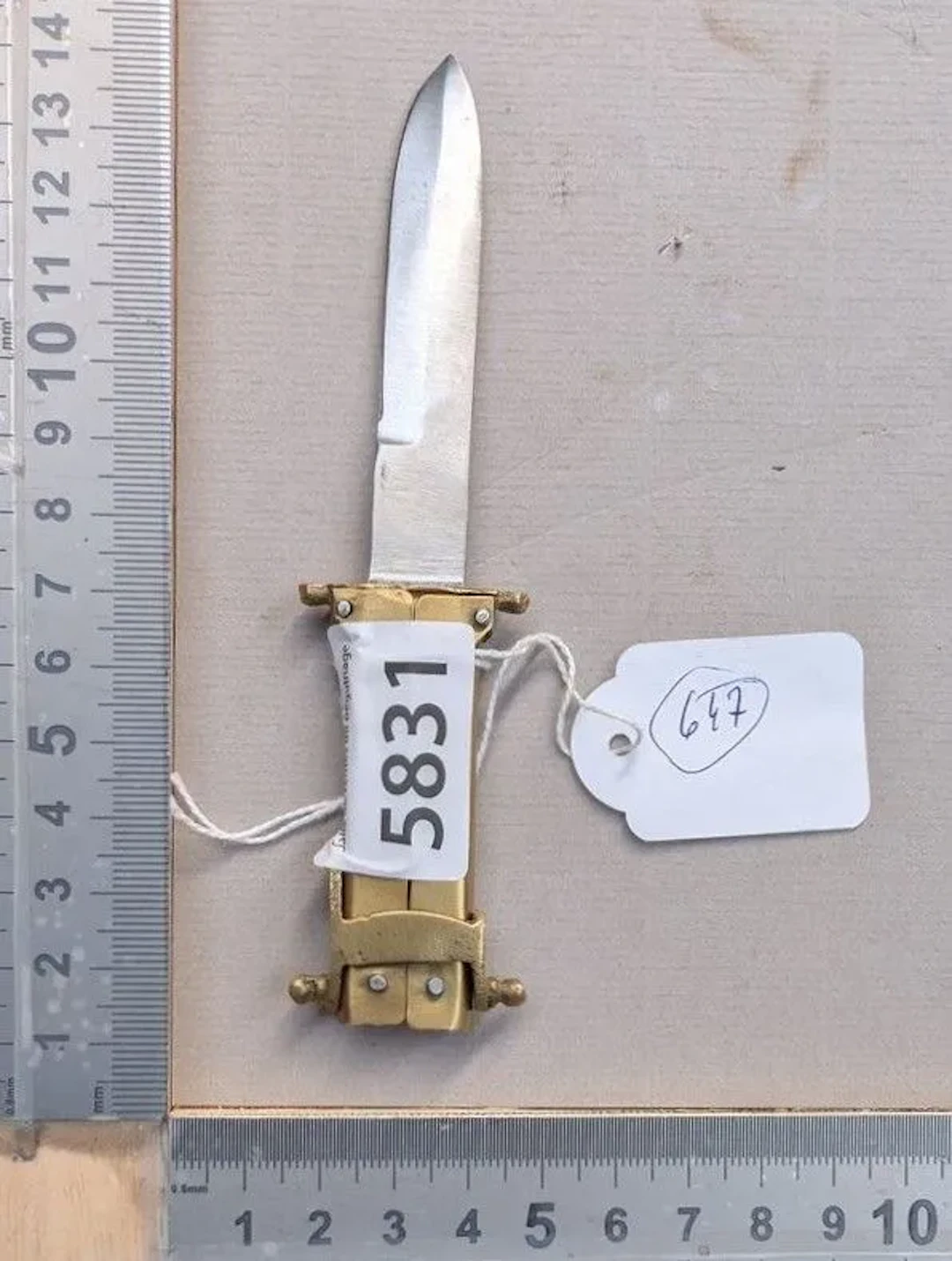 A brass pantograph knife—see photos for dimensions and condition