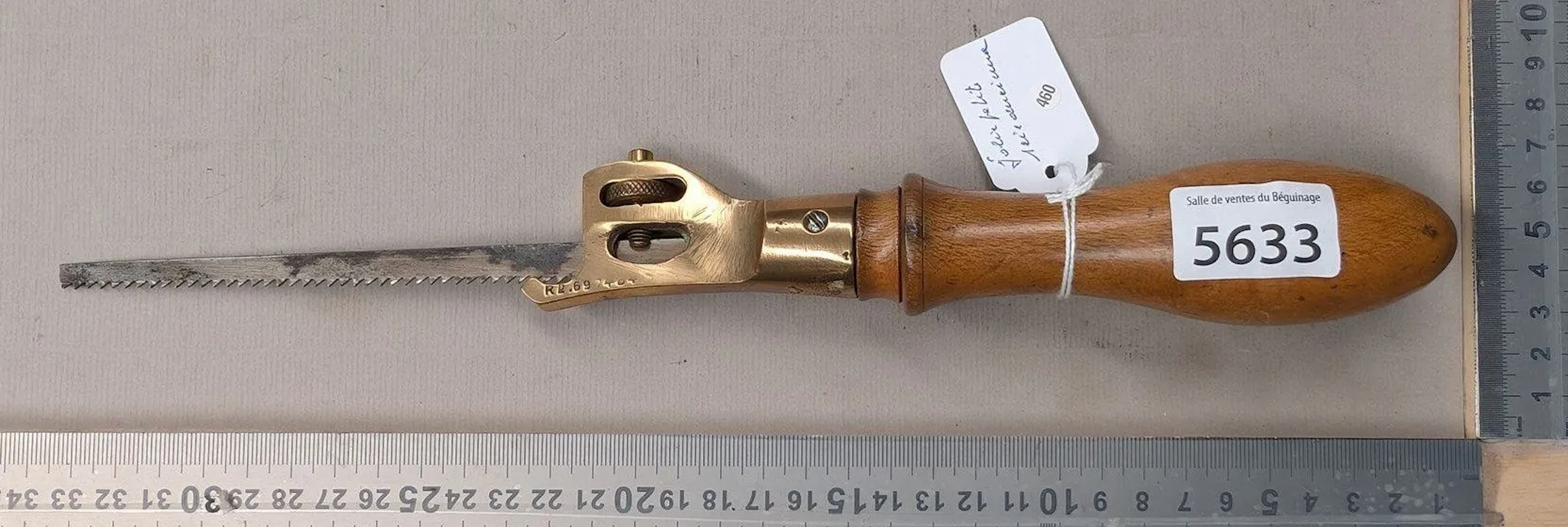 A lovely little antique saw, a rare find—see photos for dimensions