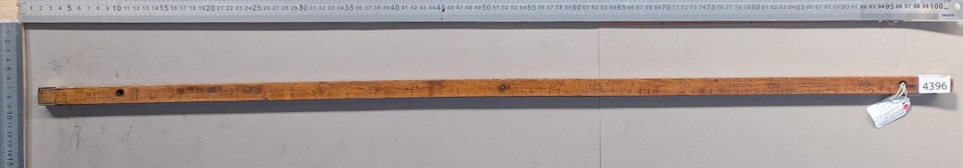 Antique wooden and brass measuring tape—see photos for dimensions and condition