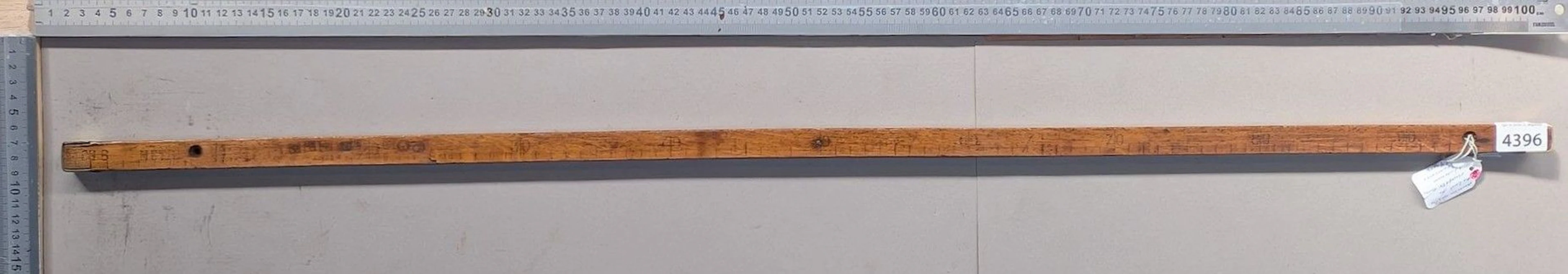 Antique wooden and brass measuring tape—see photos for dimensions and condition