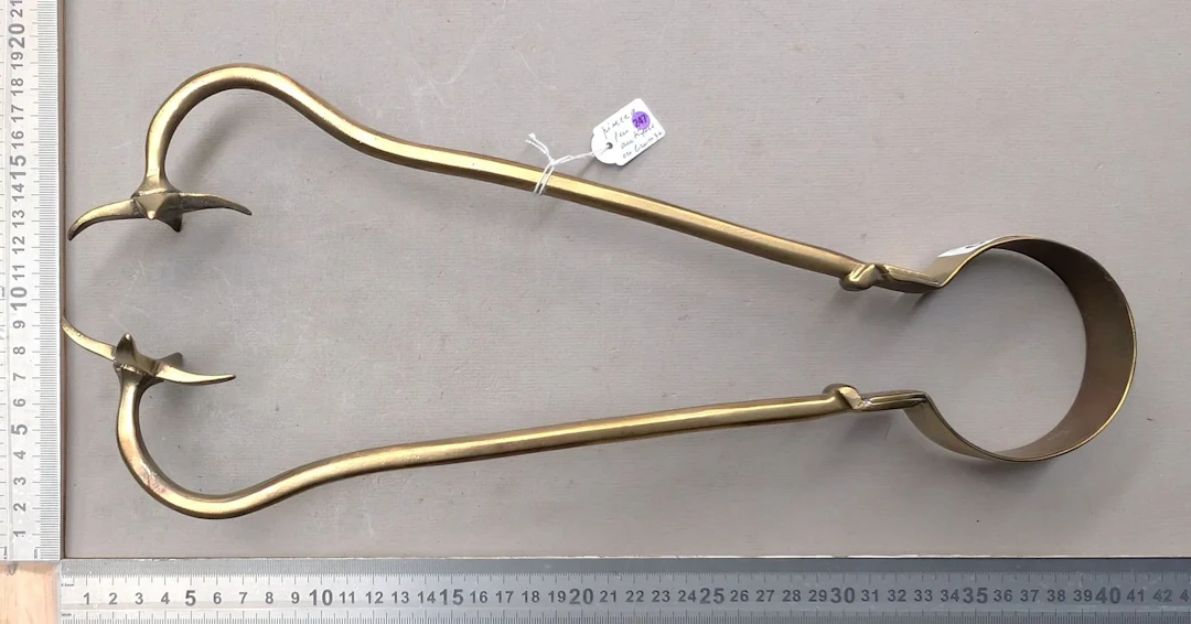1 brass fire tongs - See photos for dimensions and condition