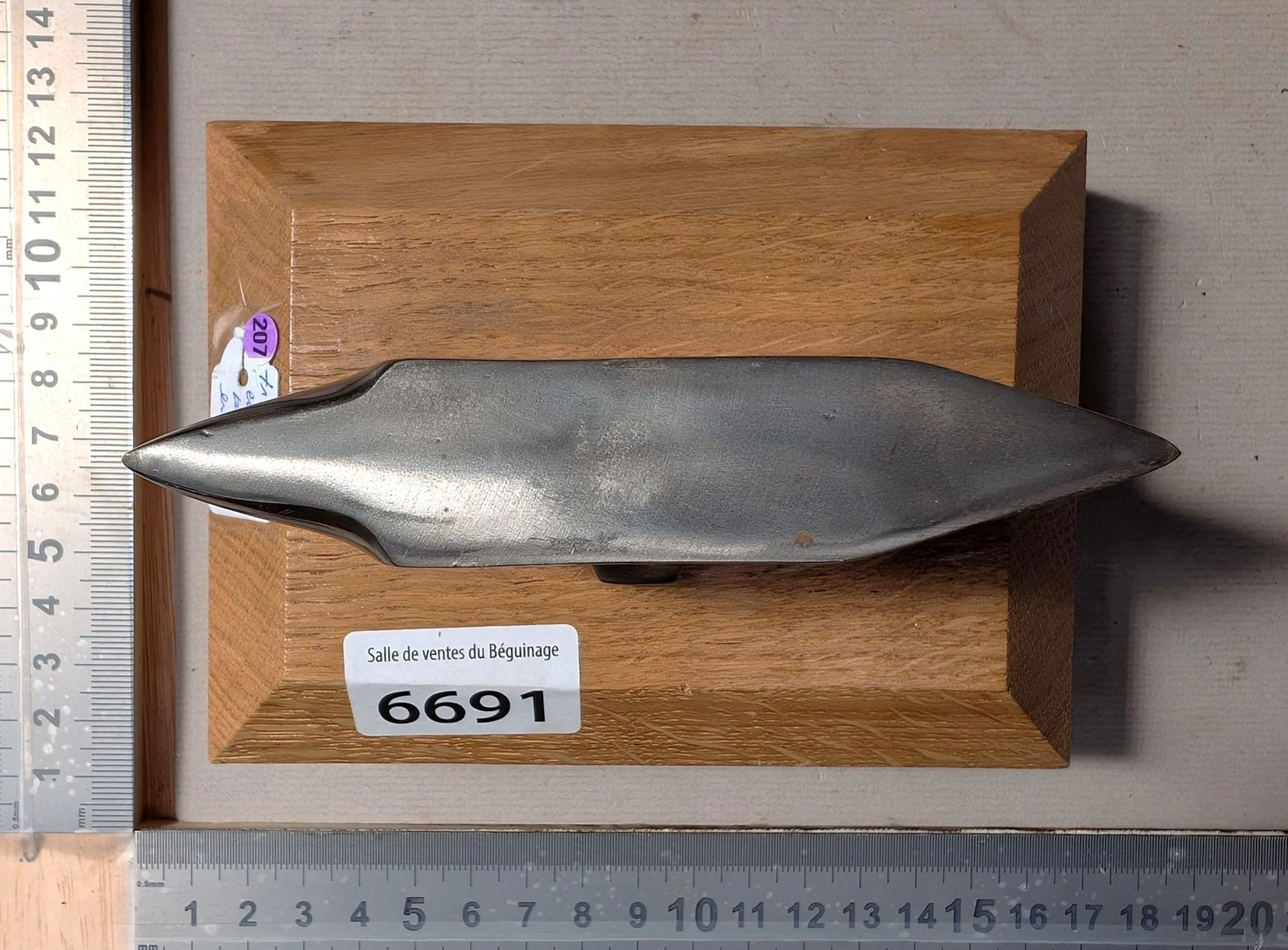 Beautiful watchmaker's anvil on an oak base—see photos for dimensions