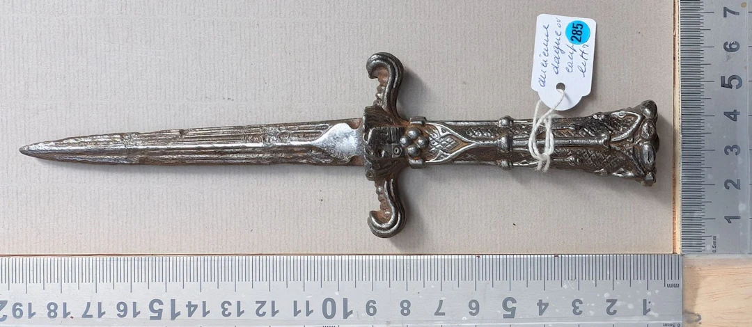 1 antique dagger or letter opener—a beautiful piece. See photos for