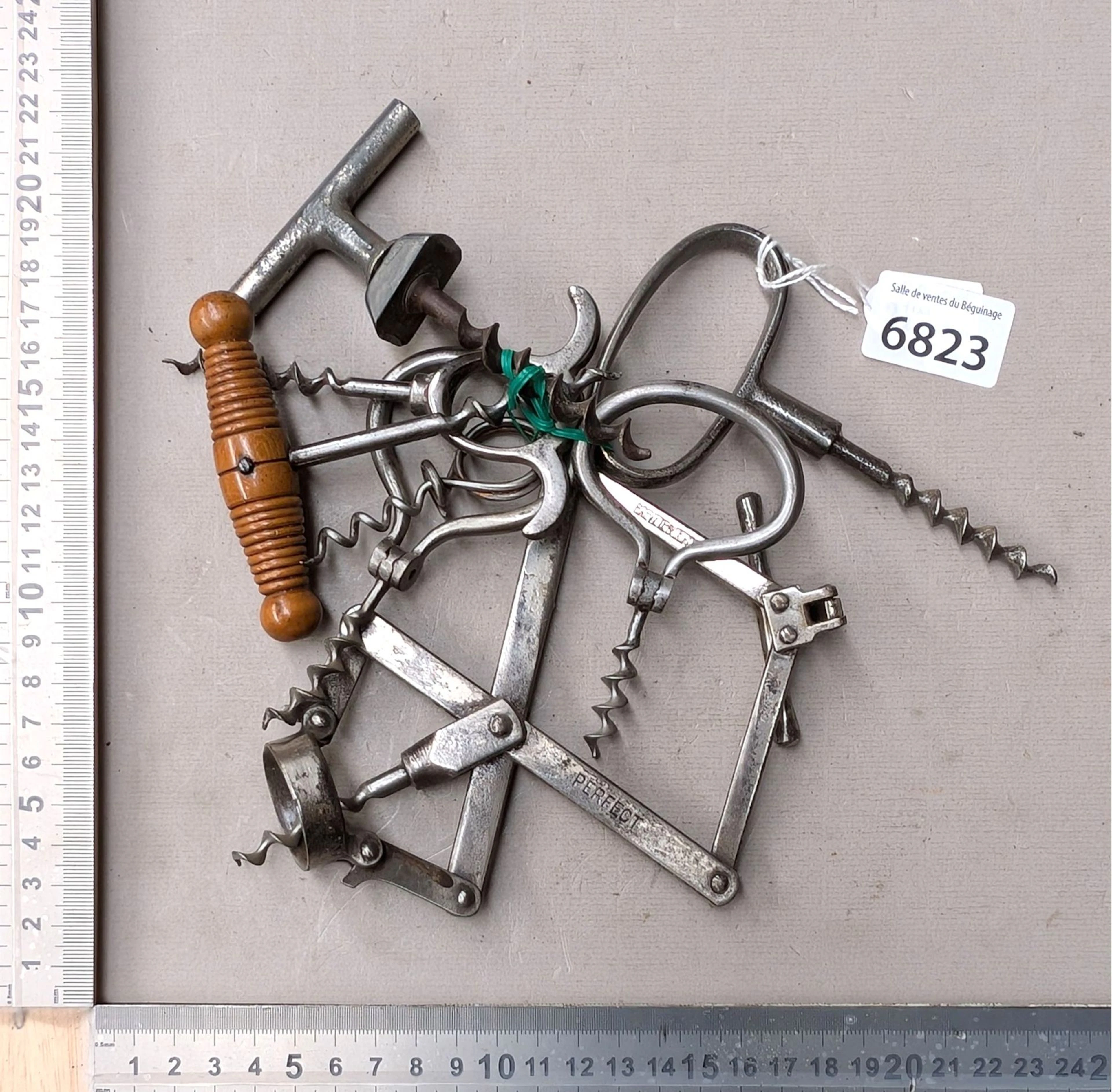 8 antique corkscrews—see photos for dimensions and condition