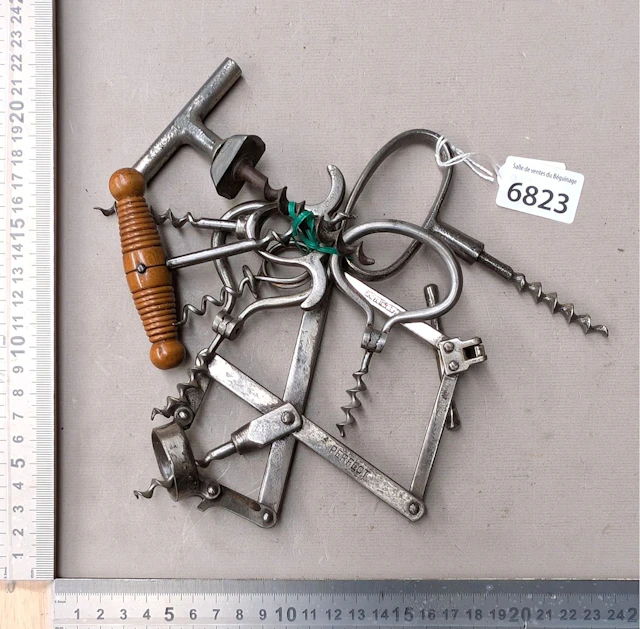 8 antique corkscrews—see photos for dimensions and condition