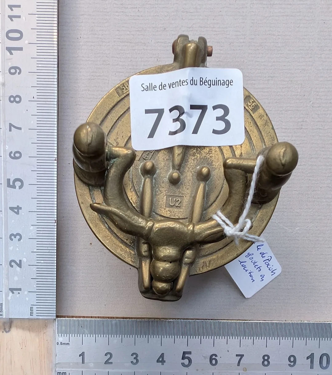 Stack of brass cup weights—see photos for dimensions and condition