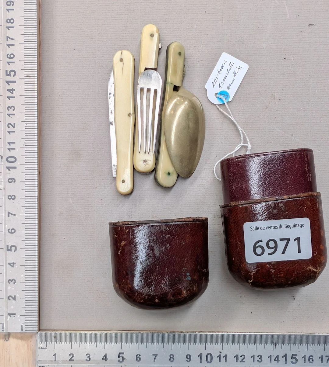 Antique travel cutlery set in its knife, fork, and spoon case - See