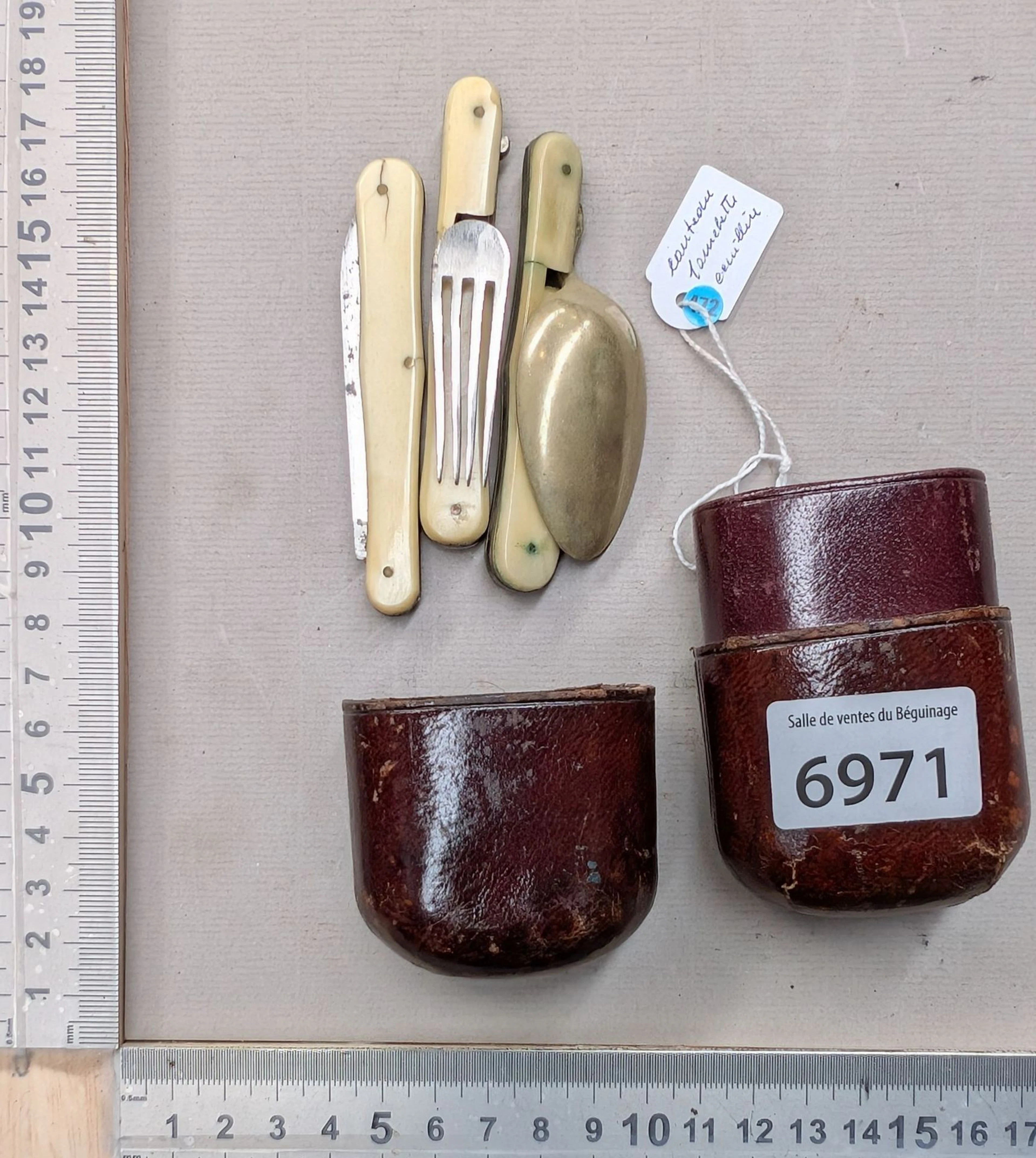 Antique travel cutlery set in its knife, fork, and spoon case - See