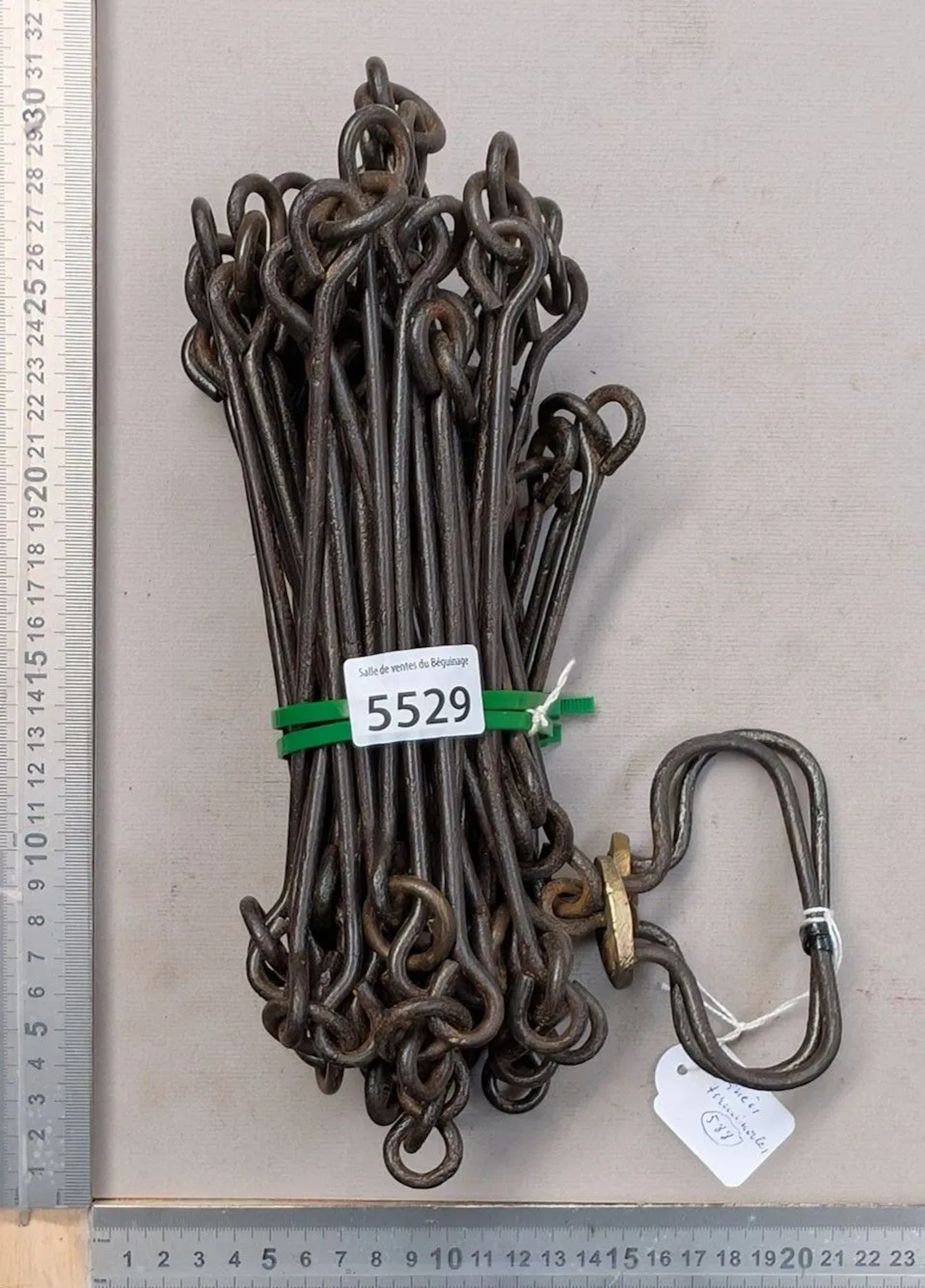 Antique wrought-iron surveyor's chain, with hinged links and two handles