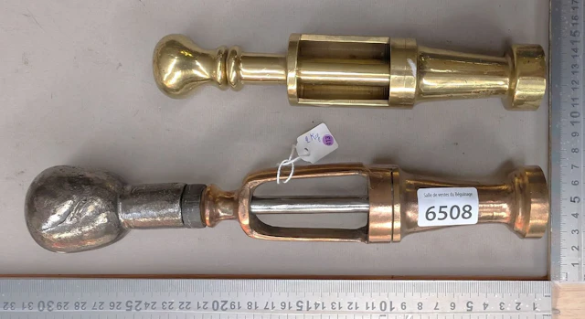 Two antique 2-kg bronze corking machines—see photos for dimensions