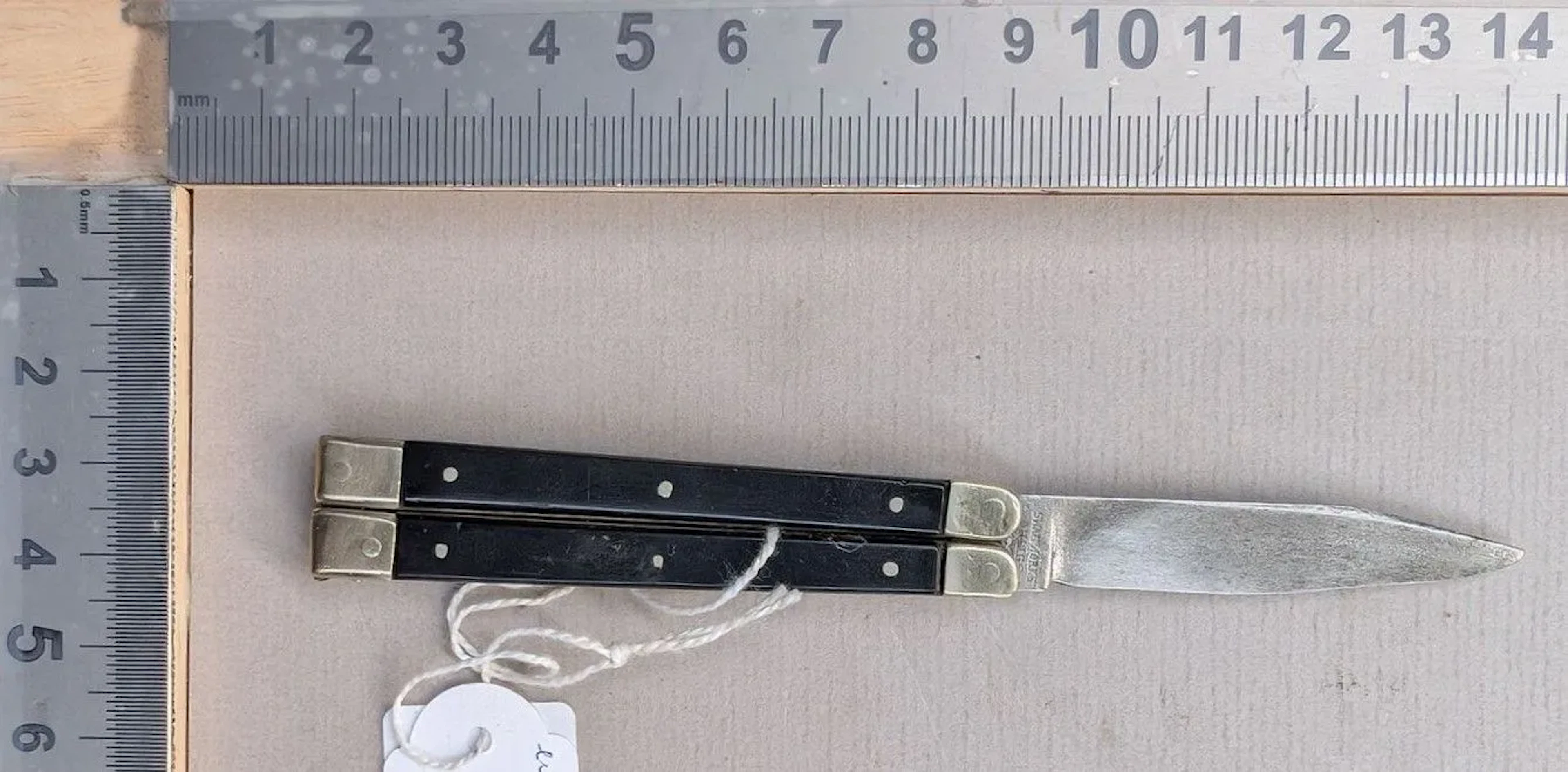SWAN-WORKS-OHIGS GERMANY butterfly knife; the mechanism has a little