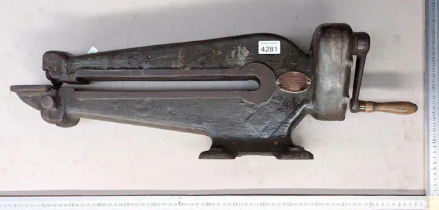 Vintage leather-cutting machine—see photos for dimensions and condition